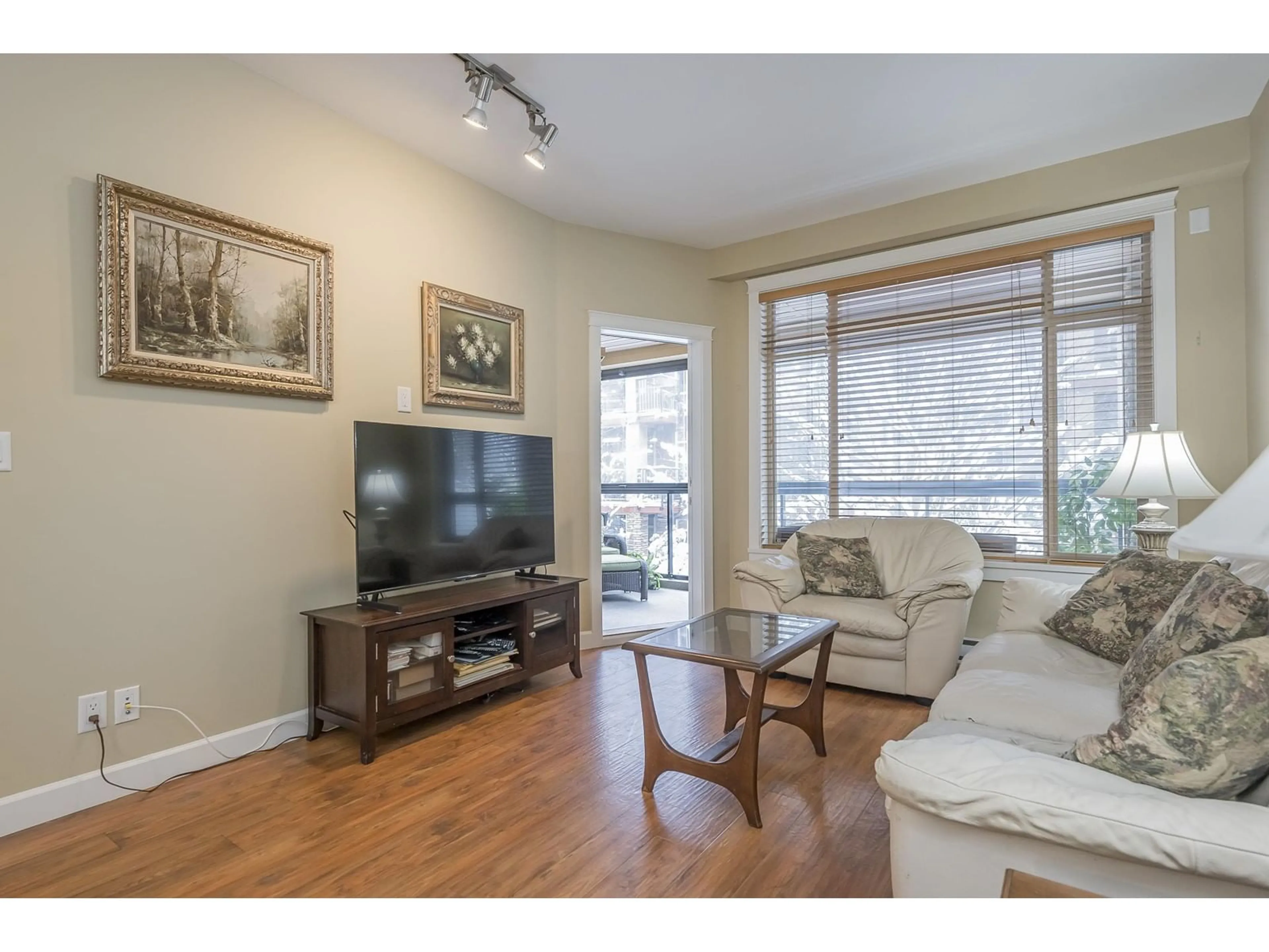 Living room with furniture, wood/laminate floor for 259 8258 207A STREET, Langley British Columbia V2Y0N4