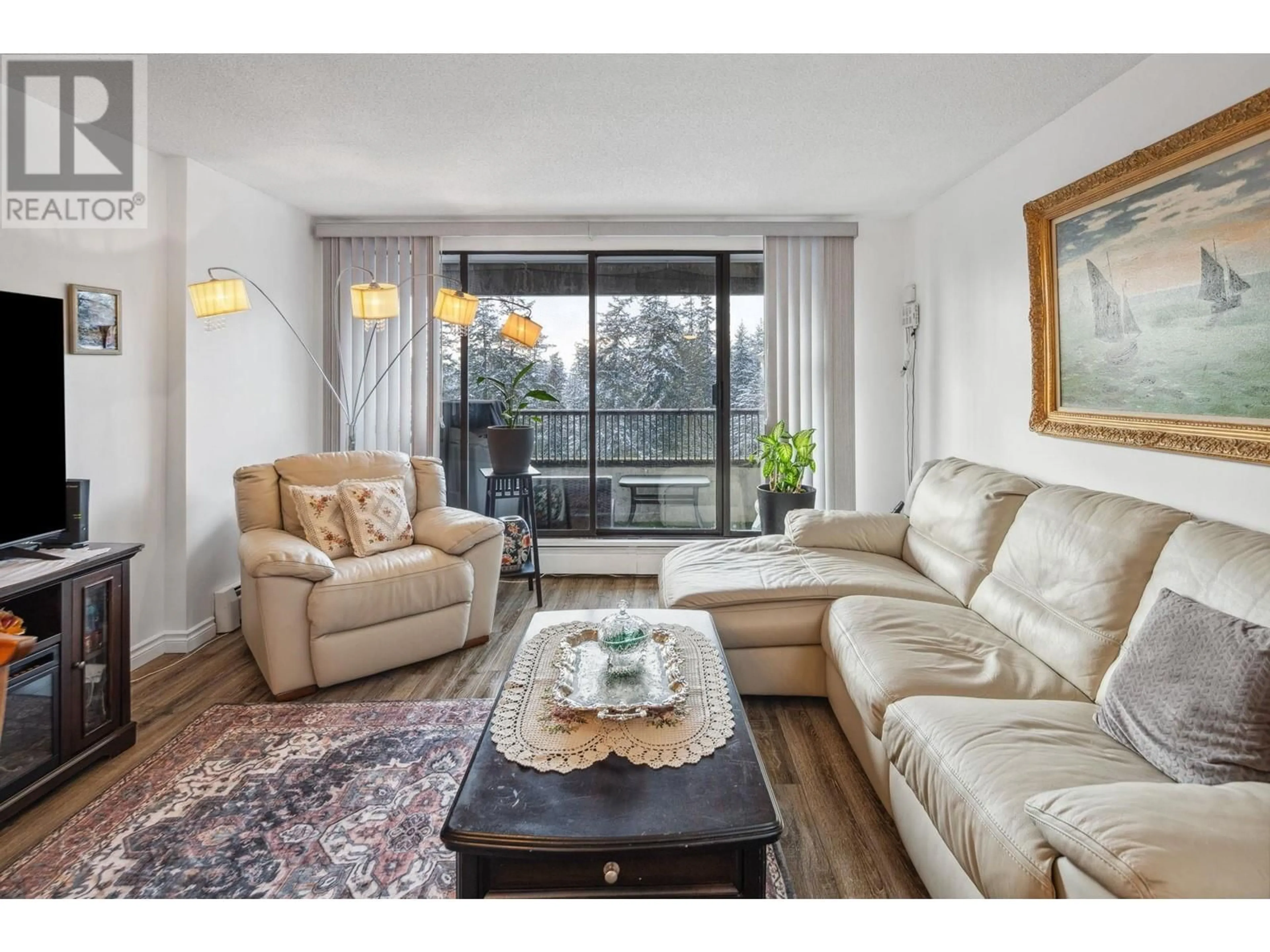 Living room with furniture, wood/laminate floor for 1101 6595 WILLINGDON AVENUE, Burnaby British Columbia V5H4E5