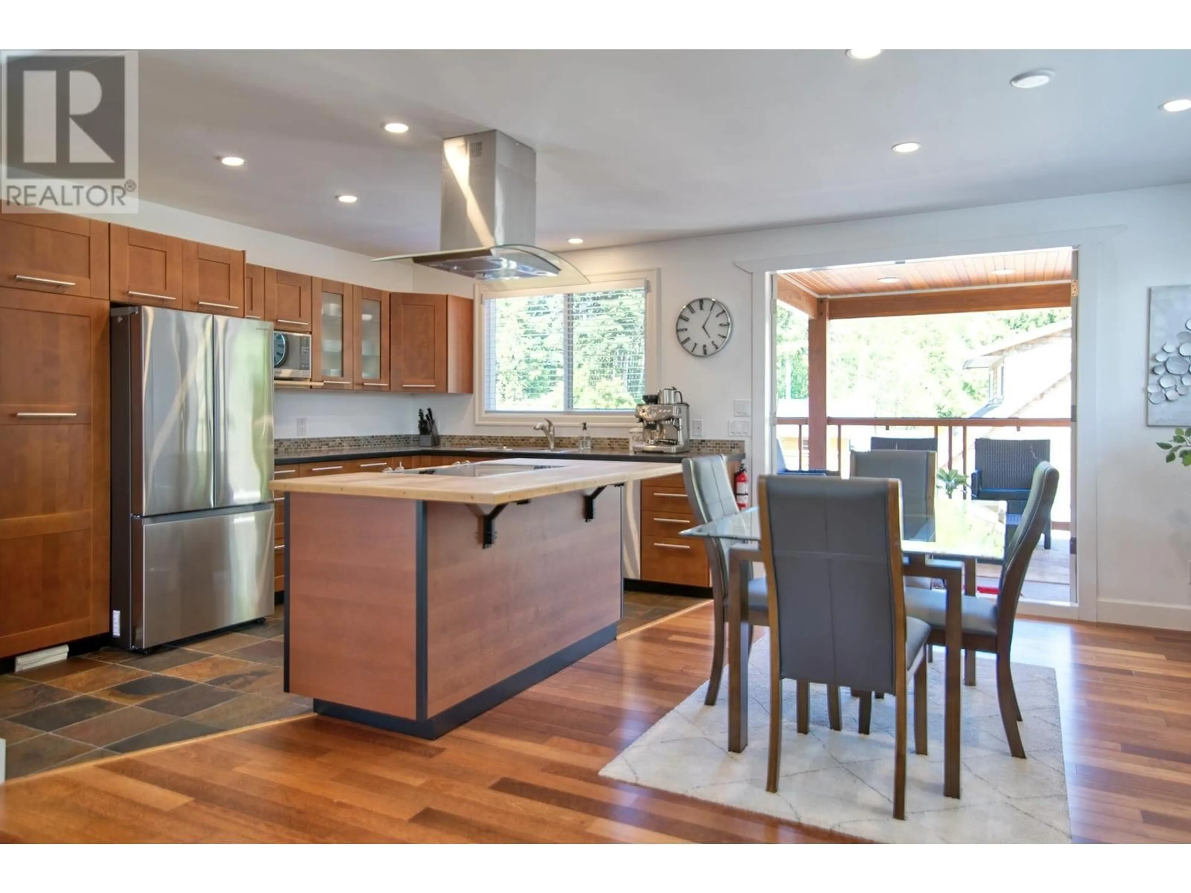 Open concept kitchen, wood/laminate floor for 5740-42 NICKERSON ROAD, Sechelt British Columbia V7Z0M4