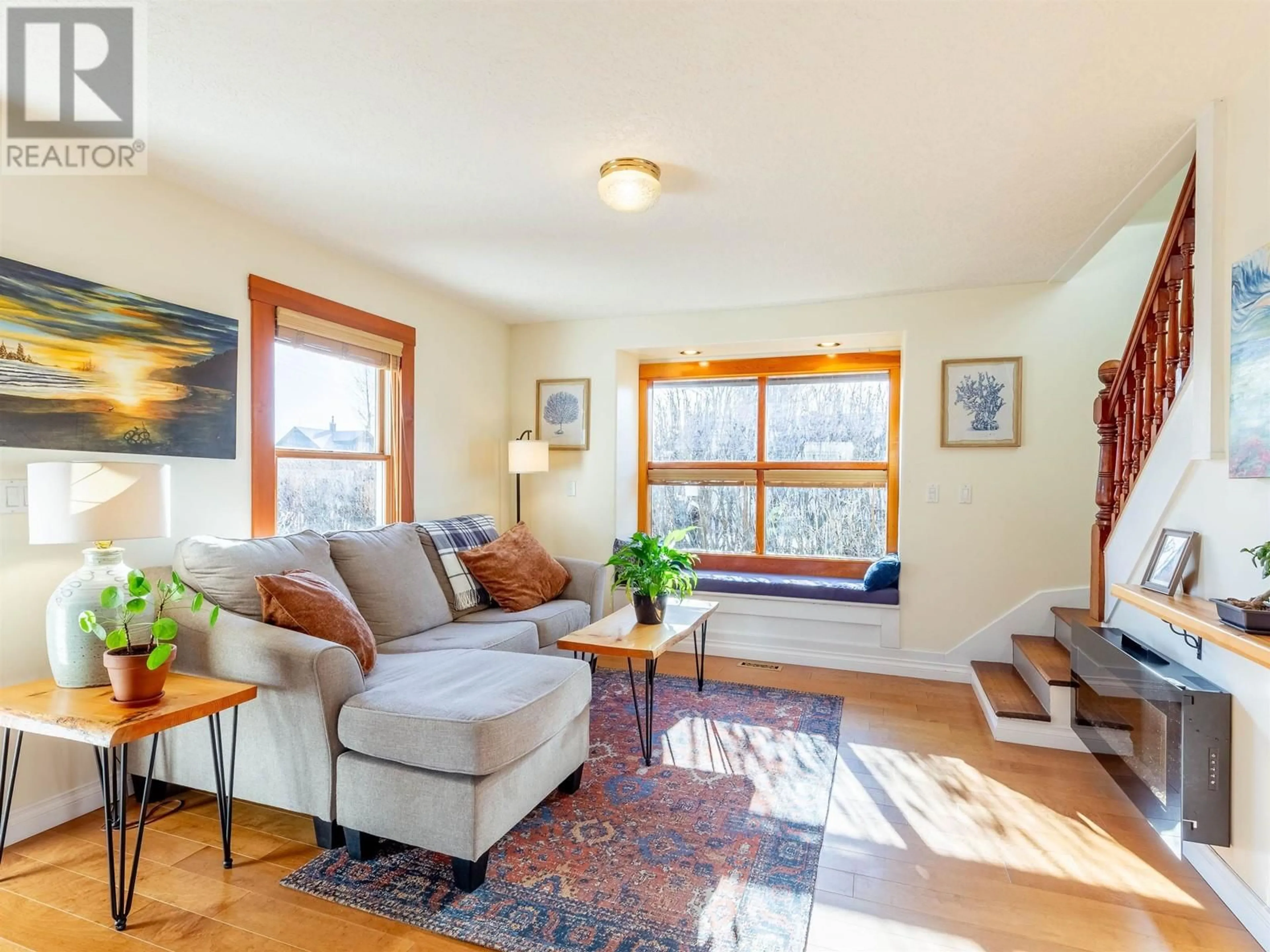 Living room with furniture, wood/laminate floor for 3907 2ND AVENUE, Smithers British Columbia V0J2N0