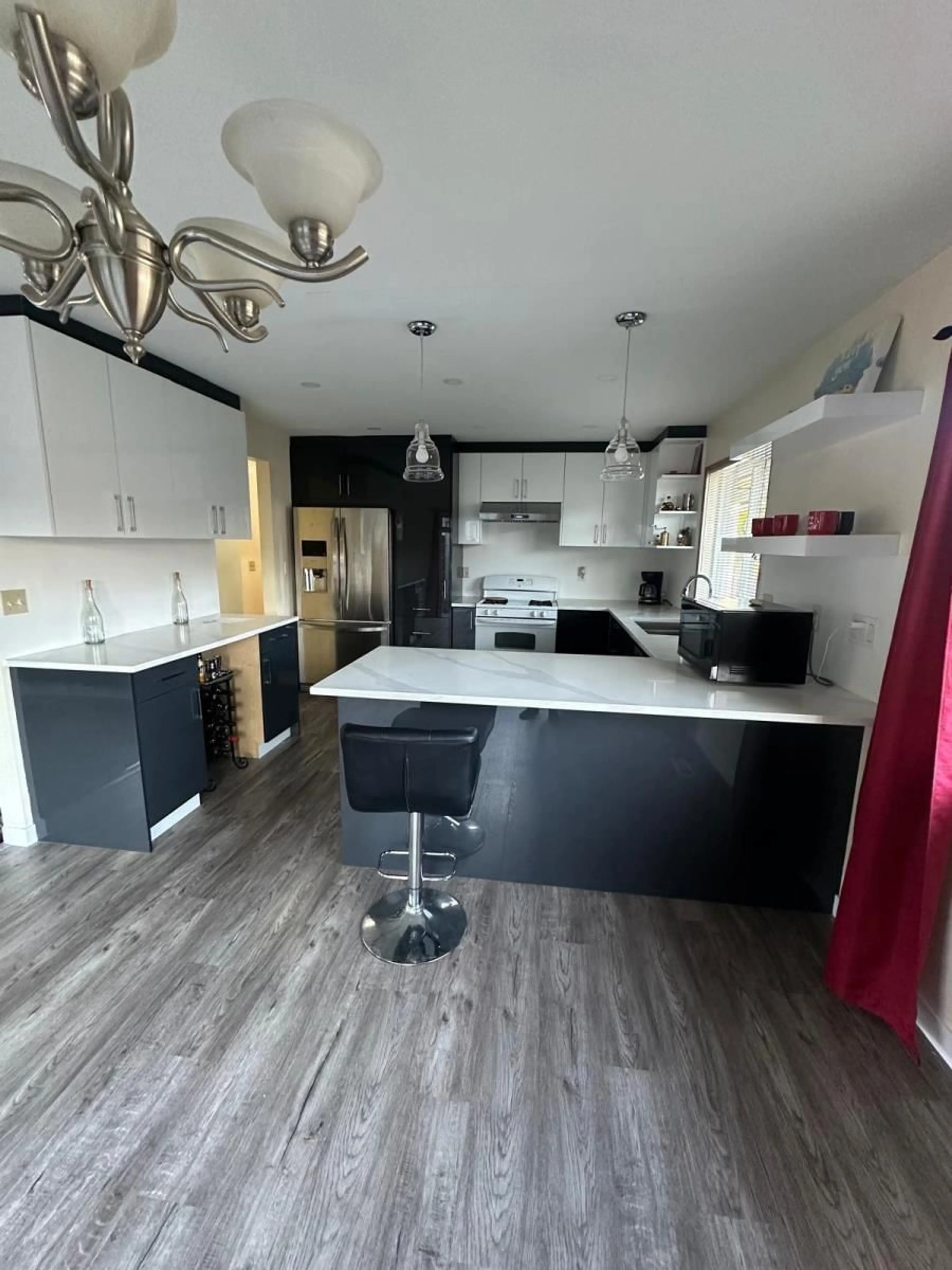 Open concept kitchen, wood/laminate floor for 1590 AGASSIZ-ROSEDALE NO 9 HIGHWAY|Agass, Agassiz British Columbia V0M1A2