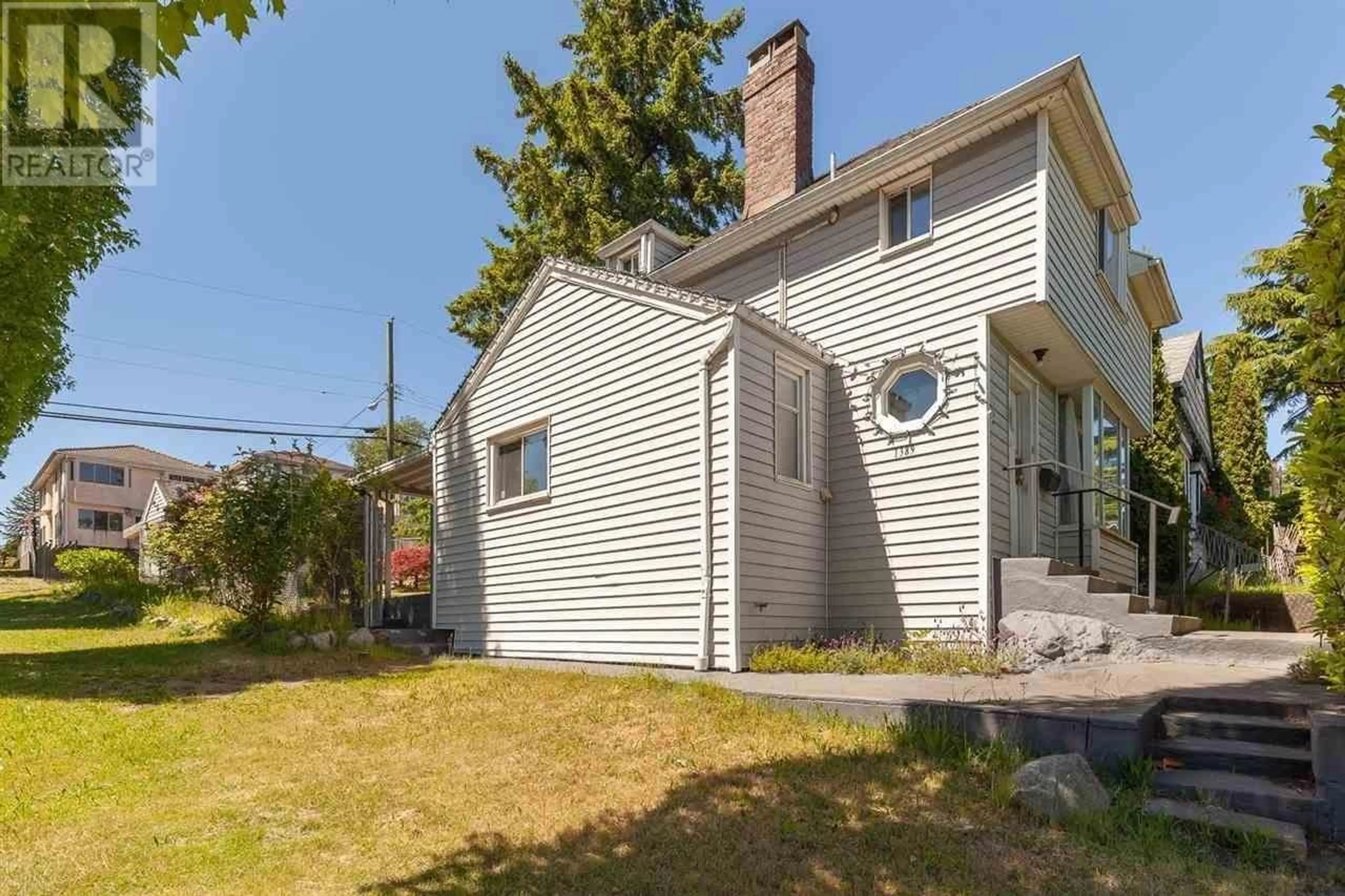 A pic from outside/outdoor area/front of a property/back of a property/a pic from drone, street for 1389 E 39TH AVENUE, Vancouver British Columbia V5W4C3