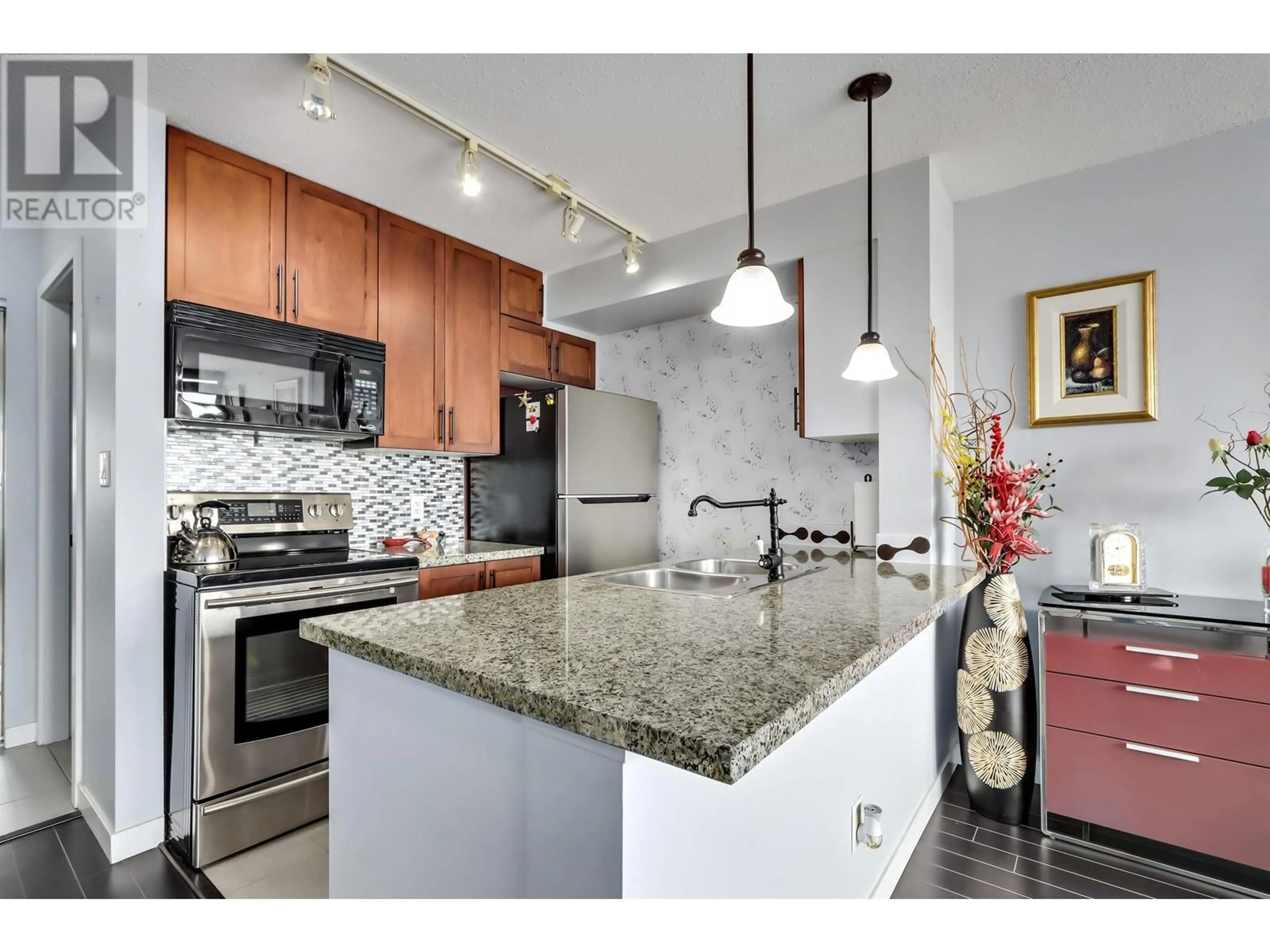 Open concept kitchen, ceramic/tile floor for 2801 688 ABBOTT STREET, Vancouver British Columbia V6B0B9