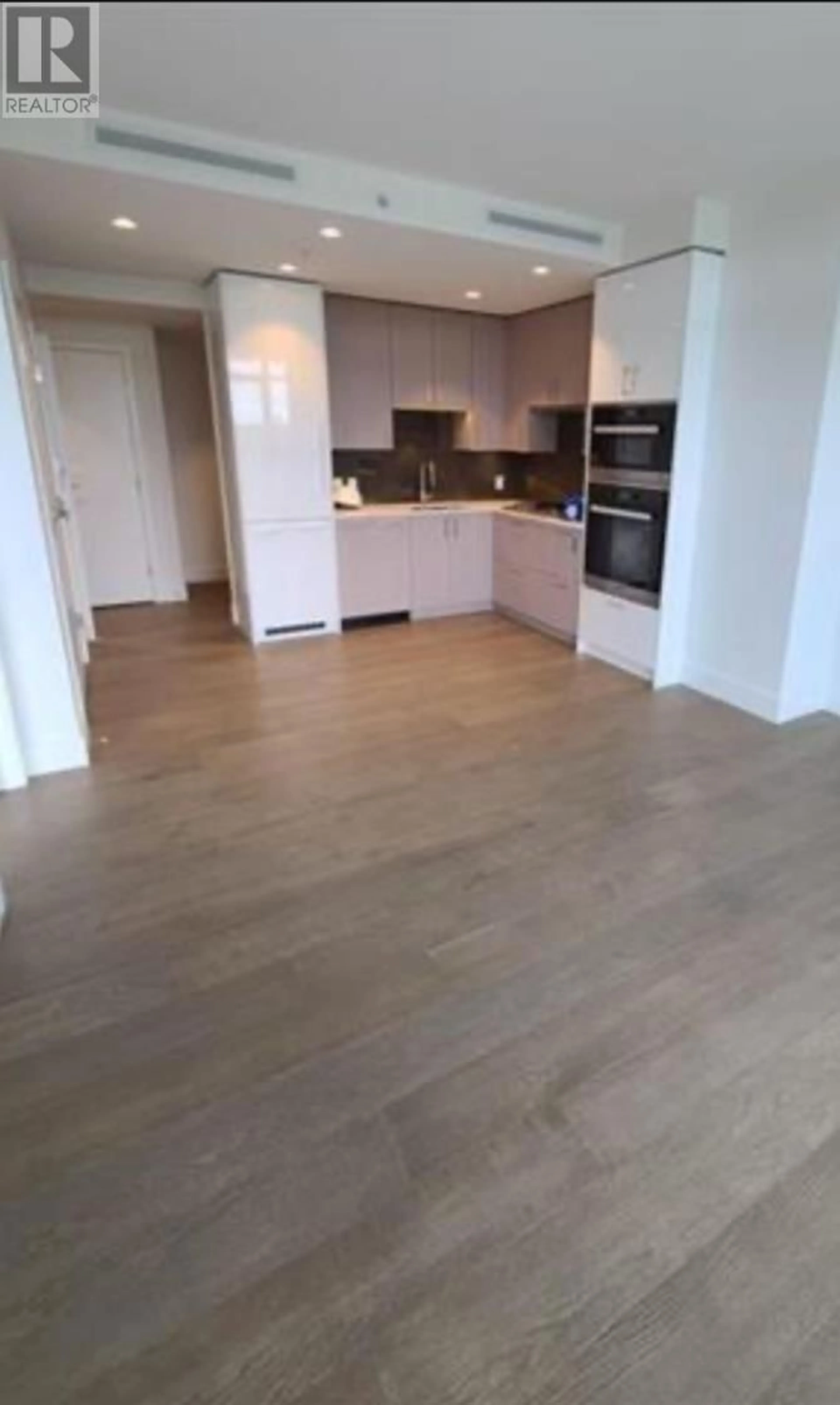Open concept kitchen, unknown for 704 - 1675 LIONS GATE LANE, North Vancouver British Columbia V7P0E3