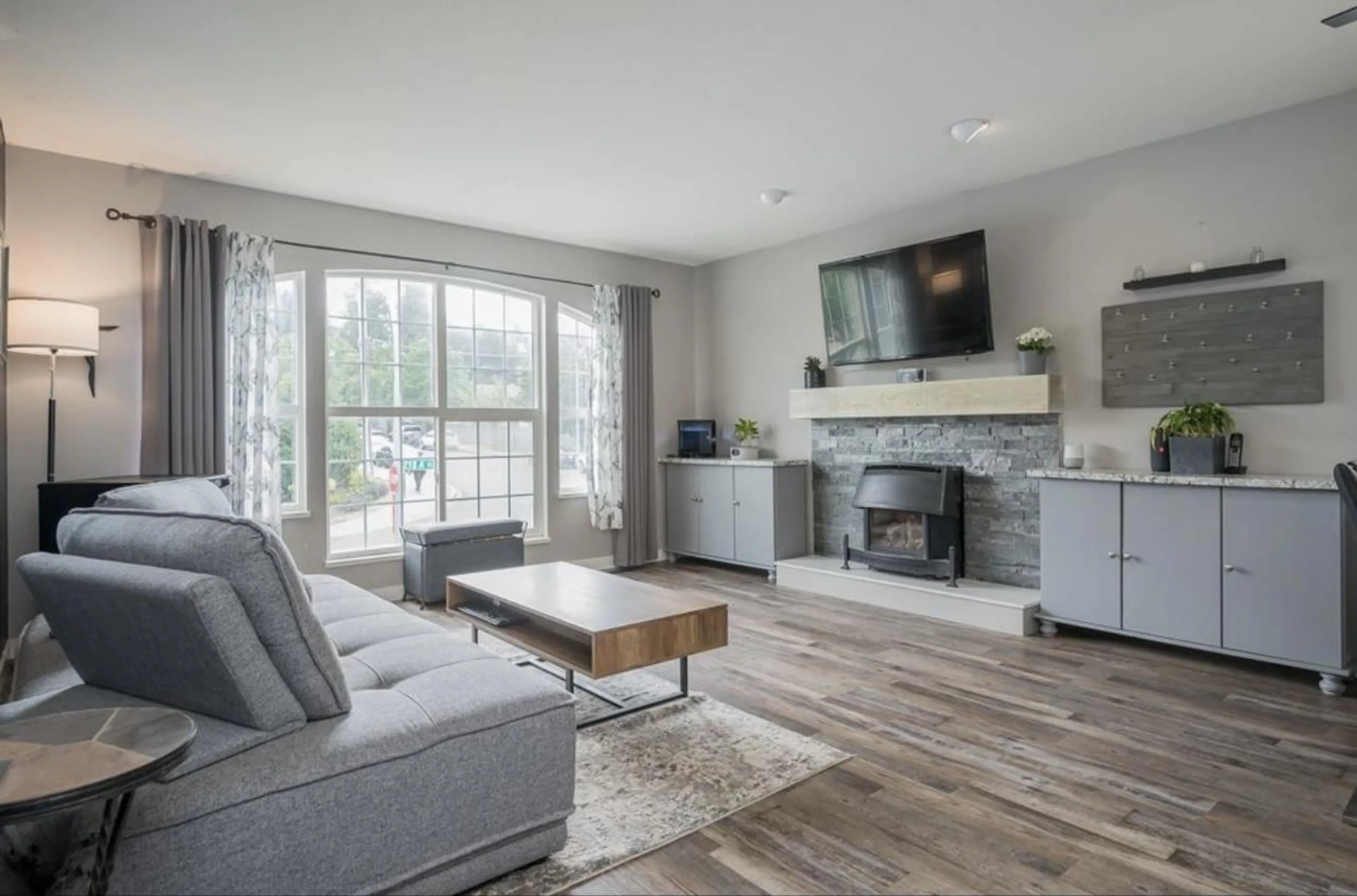 Living room with furniture, wood/laminate floor for 5001 218A STREET, Langley British Columbia V3A8K2