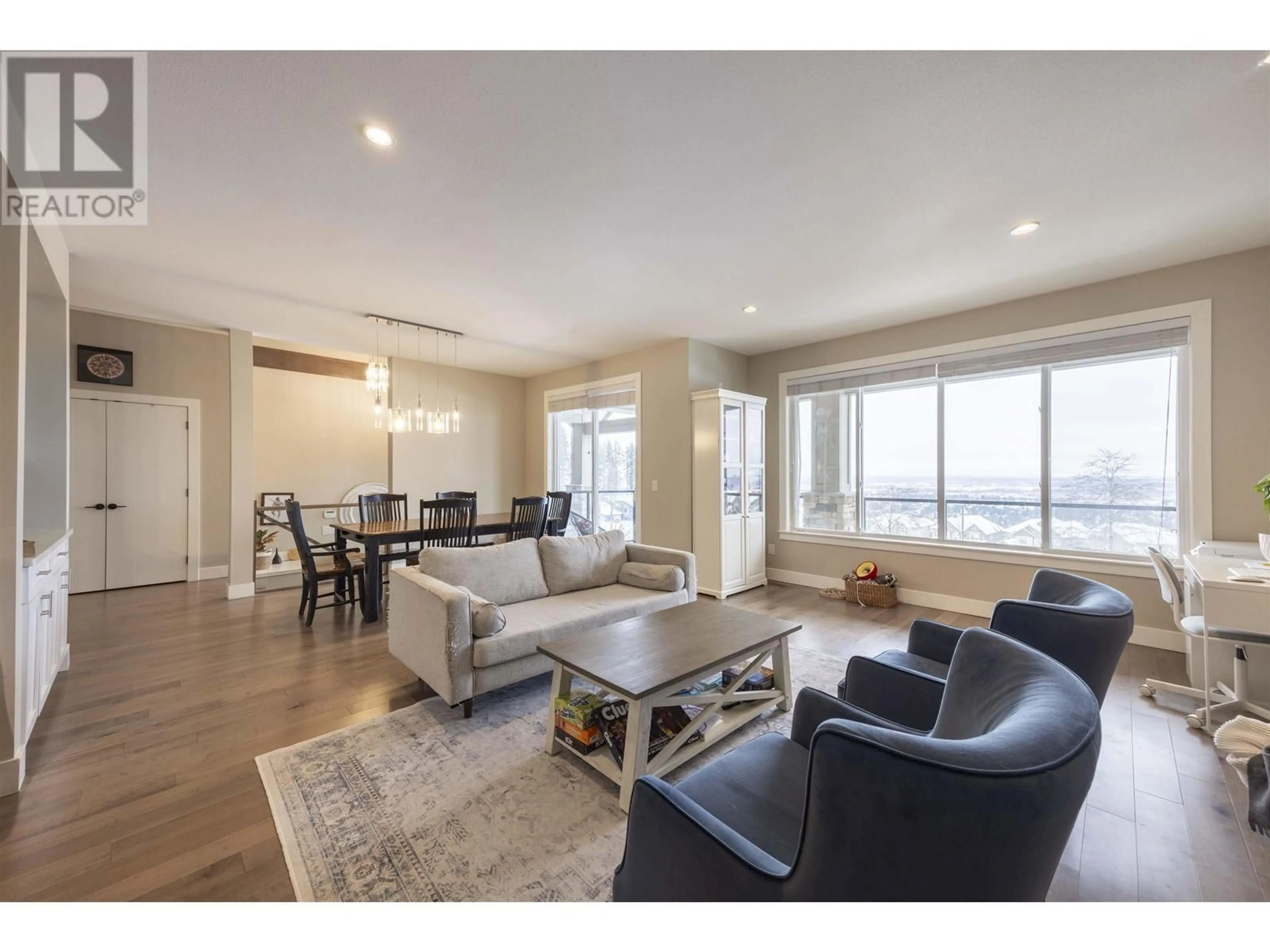 Living room with furniture, wood/laminate floor for 3501 SHEFFIELD AVENUE, Coquitlam British Columbia V3E0K2