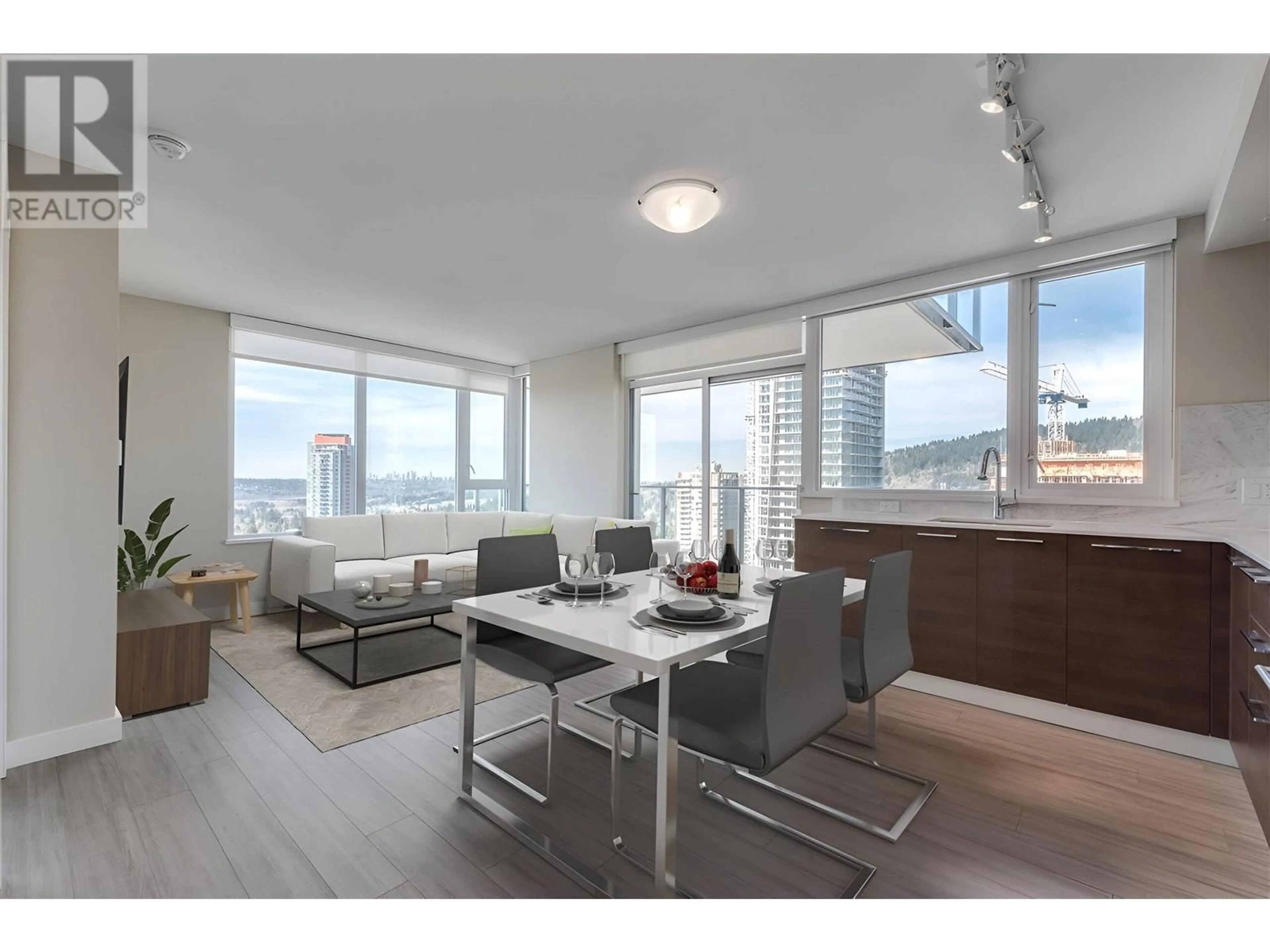 Living room with furniture, wood/laminate floor for 1702 570 EMERSON STREET, Coquitlam British Columbia V3J0G3