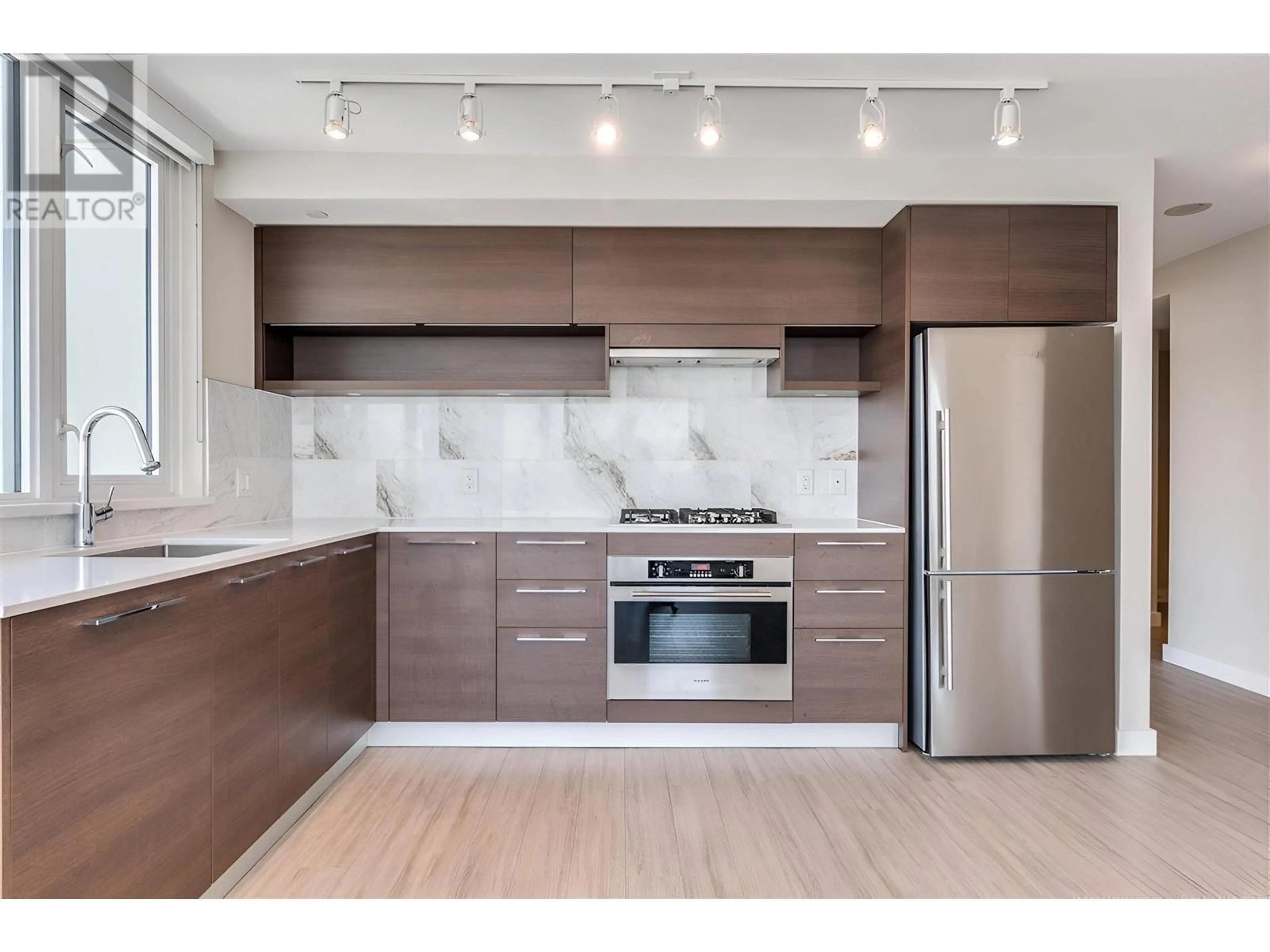 Open concept kitchen, wood/laminate floor for 1702 570 EMERSON STREET, Coquitlam British Columbia V3J0G3