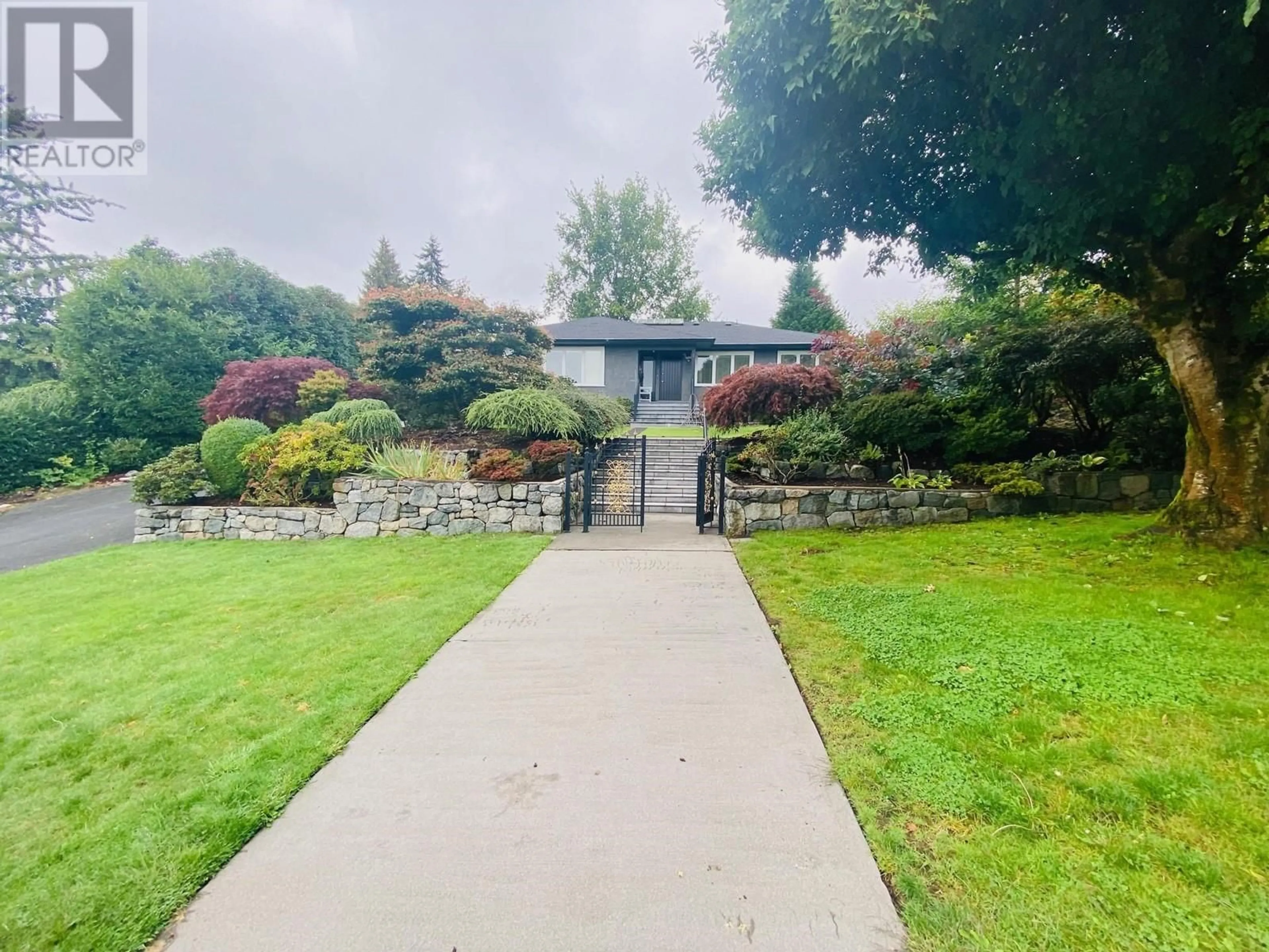 A pic from outside/outdoor area/front of a property/back of a property/a pic from drone, water/lake/river/ocean view for 6051 COLLINGWOOD PLACE, Vancouver British Columbia V6N1V2