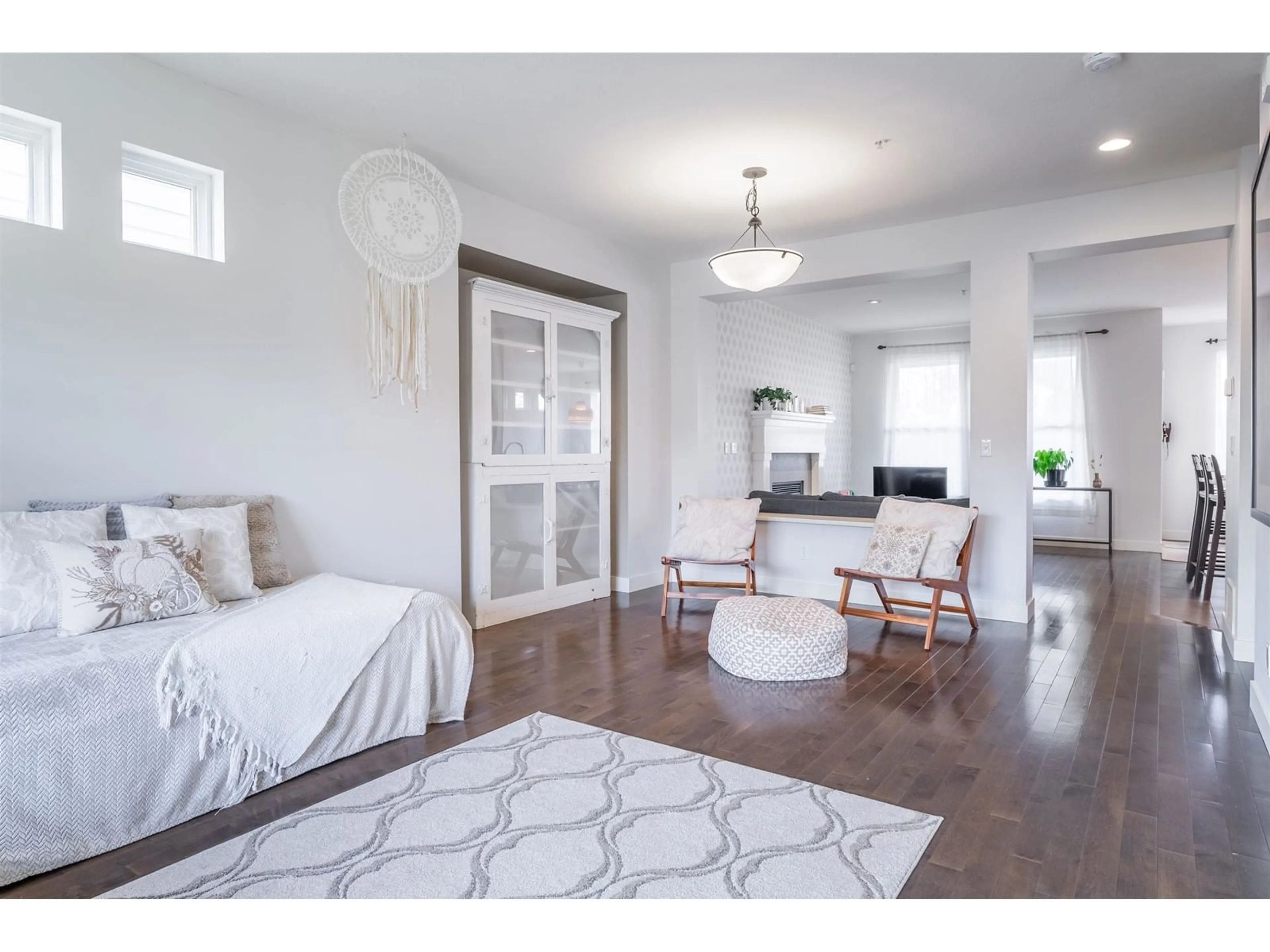 Living room with furniture, wood/laminate floor for 9359 SINGH STREET, Langley British Columbia V1M4G2