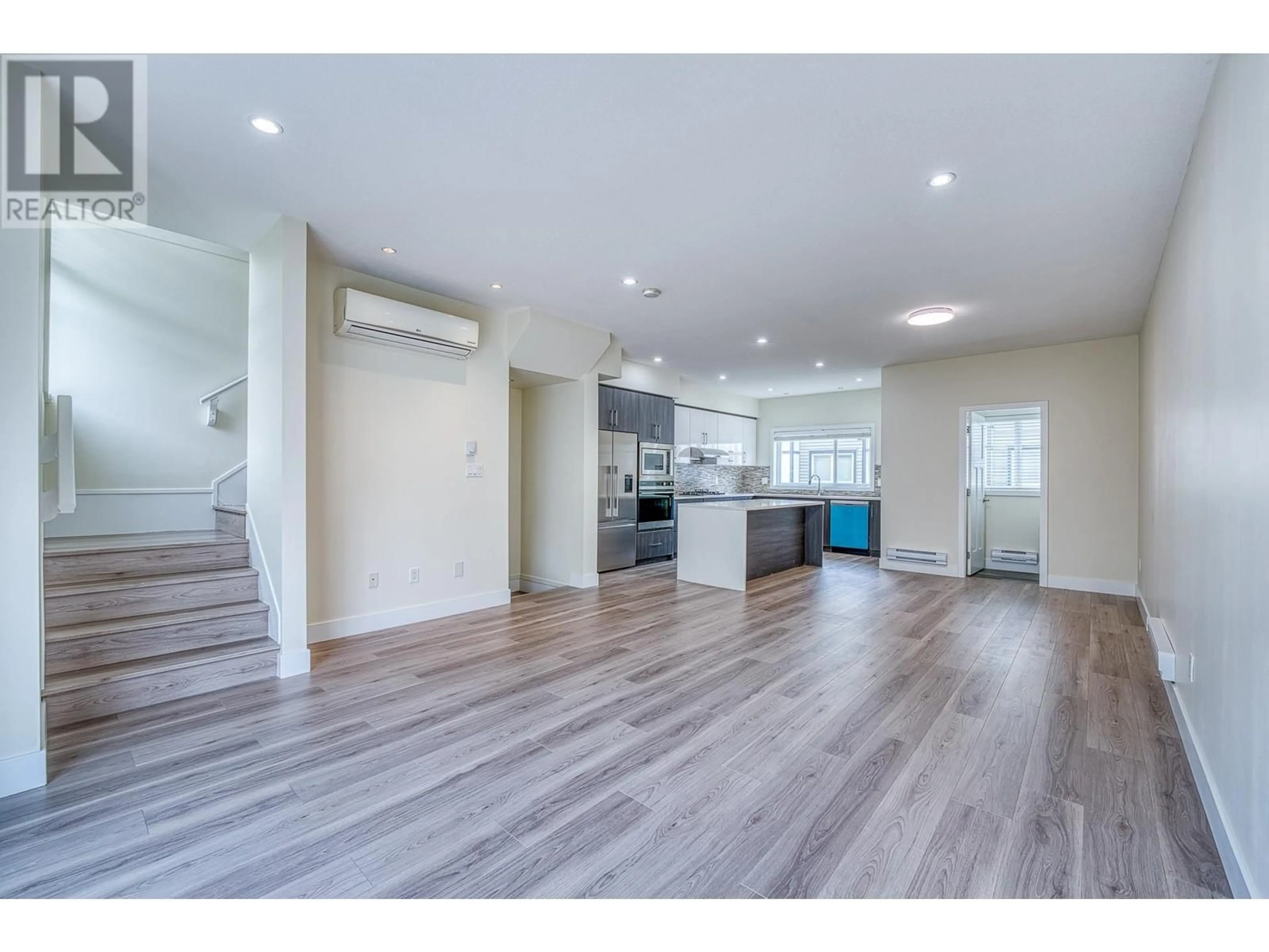Open concept kitchen, wood/laminate floor for 85 - 9680 ALEXANDRA ROAD, Richmond British Columbia V6X0P2