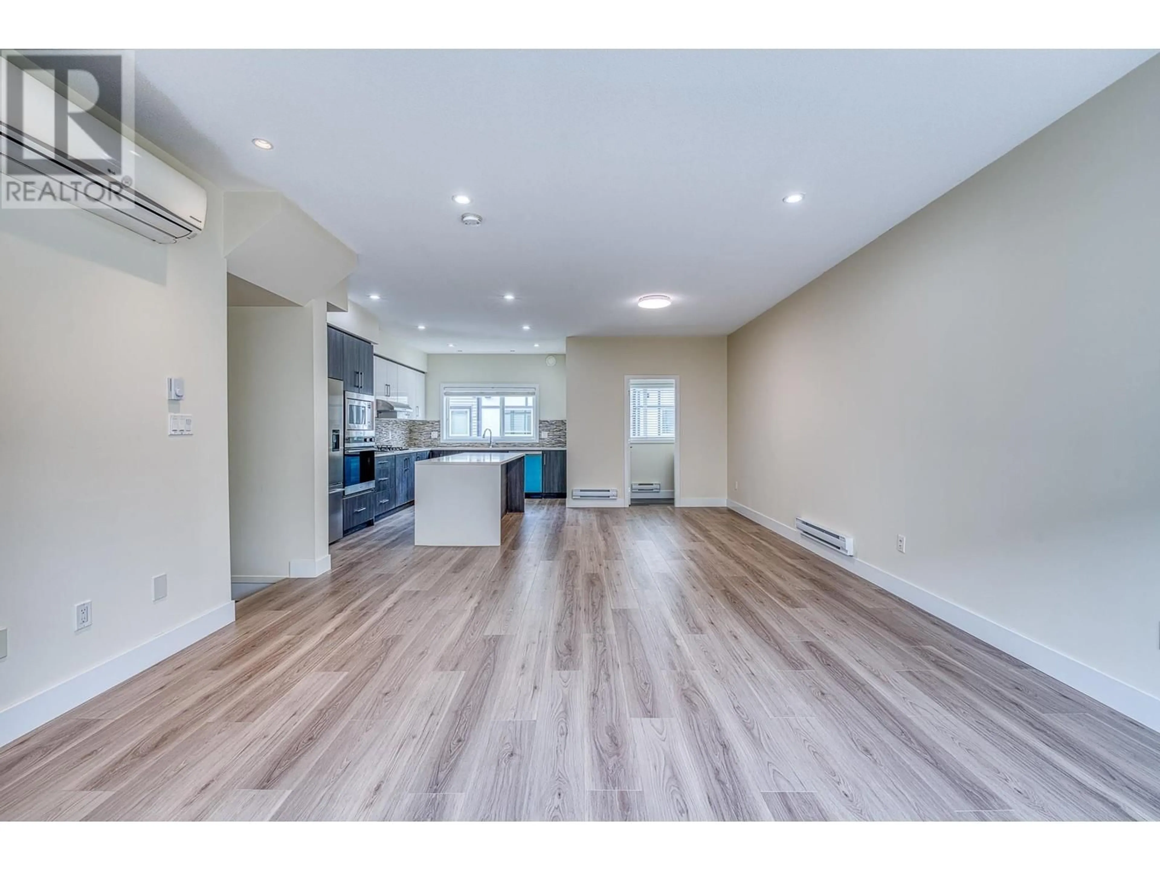 Open concept kitchen, wood/laminate floor for 85 - 9680 ALEXANDRA ROAD, Richmond British Columbia V6X0P2