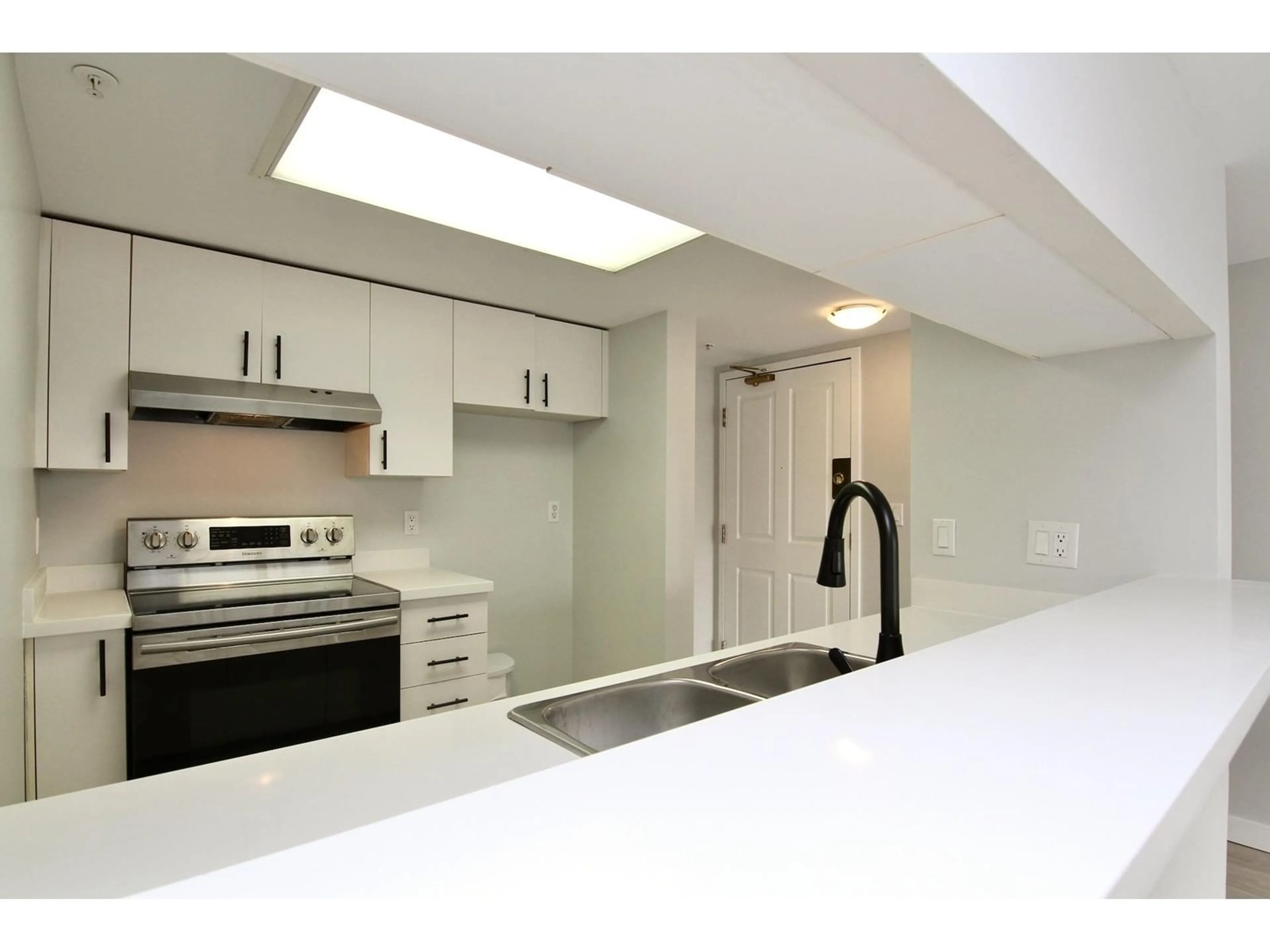 Open concept kitchen, unknown for 1306 10523 UNIVERSITY DRIVE, Surrey British Columbia V3T5T8