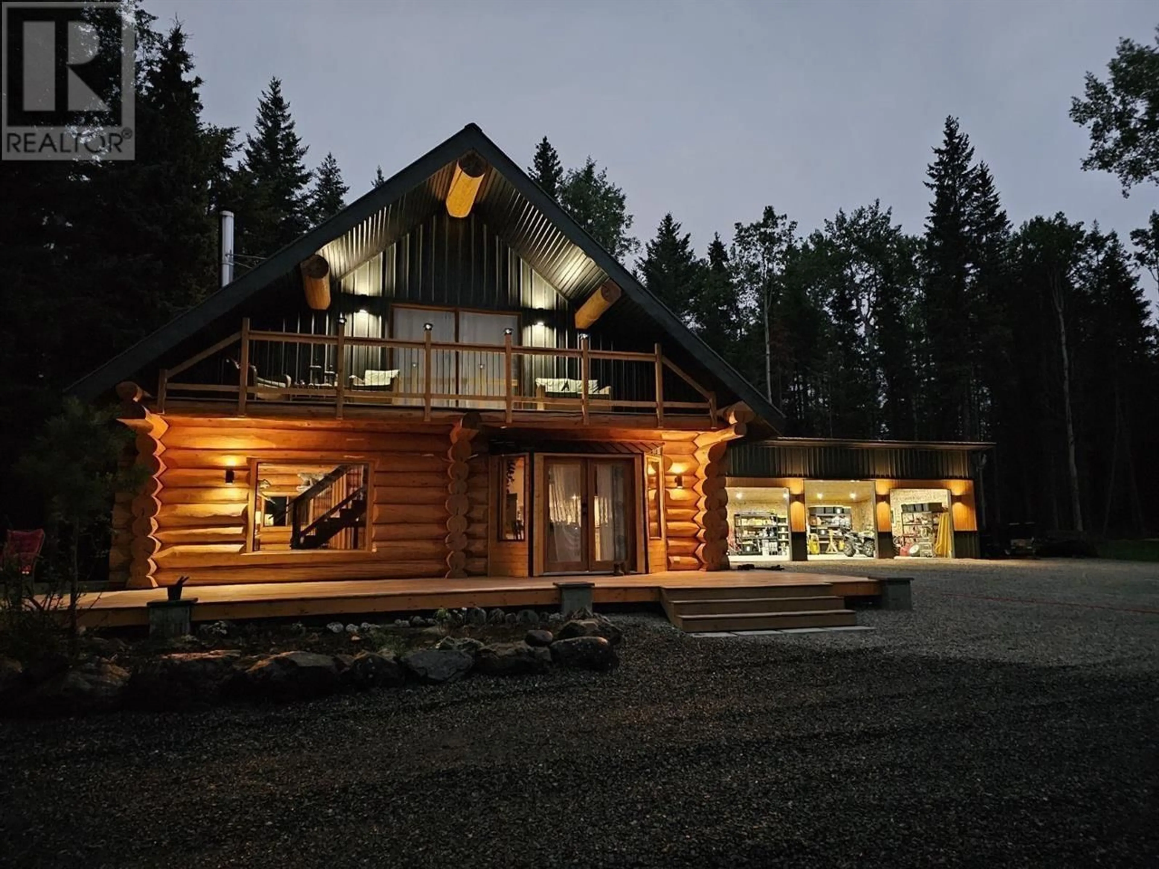 A pic from outside/outdoor area/front of a property/back of a property/a pic from drone, forest/trees view for 6847 FAWN LK AC01 ROAD, 100 Mile House British Columbia V0K1X1