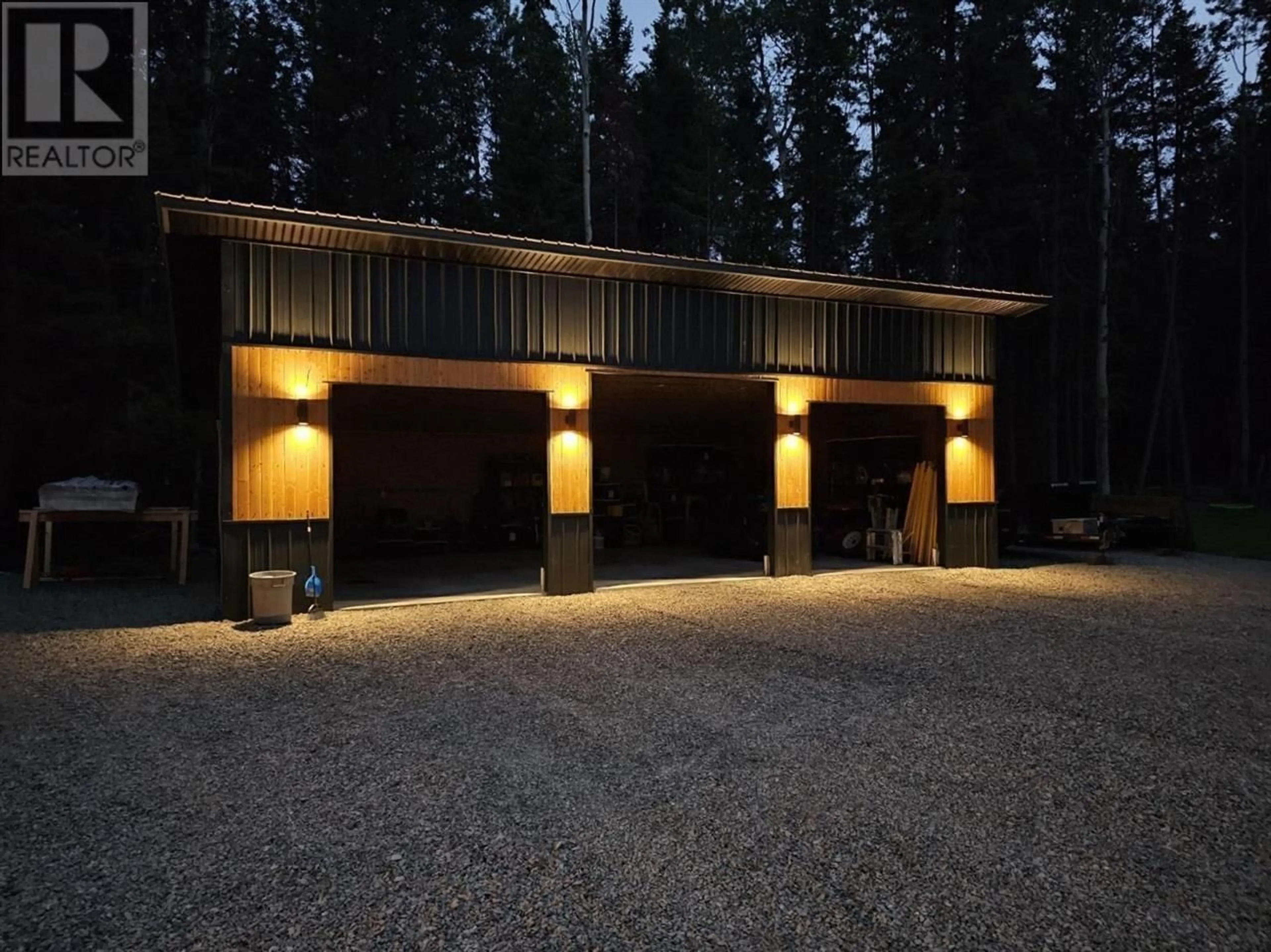 A pic from outside/outdoor area/front of a property/back of a property/a pic from drone, unknown for 6847 FAWN LK AC01 ROAD, 100 Mile House British Columbia V0K1X1