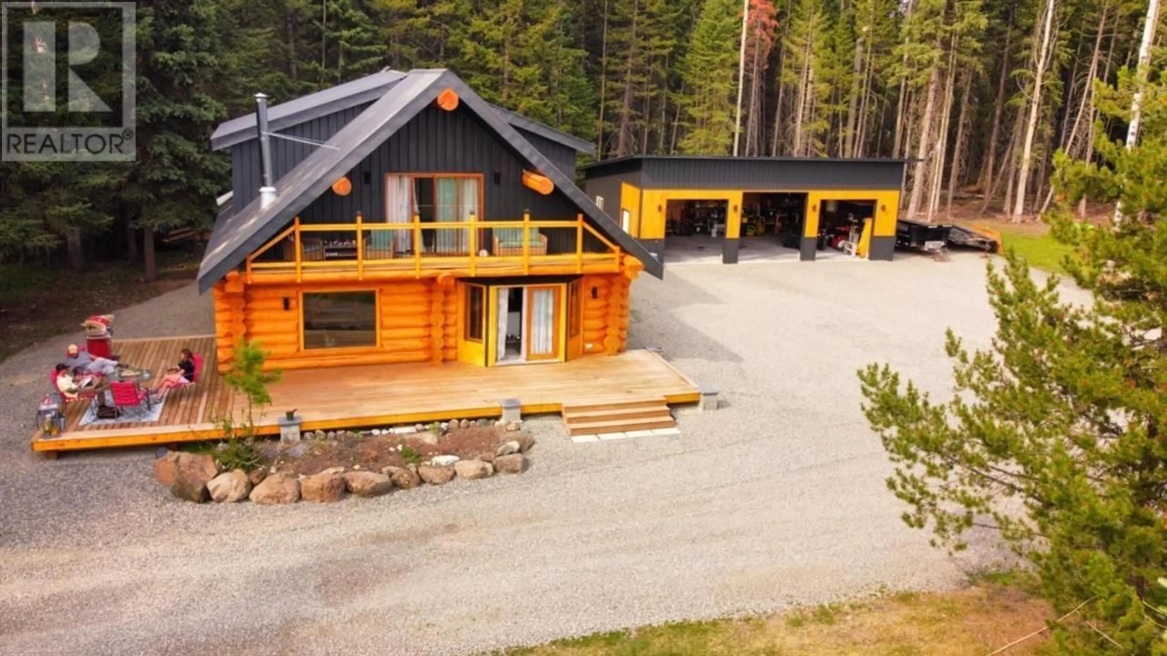 A pic from outside/outdoor area/front of a property/back of a property/a pic from drone, unknown for 6847 FAWN LK AC01 ROAD, 100 Mile House British Columbia V0K1X1