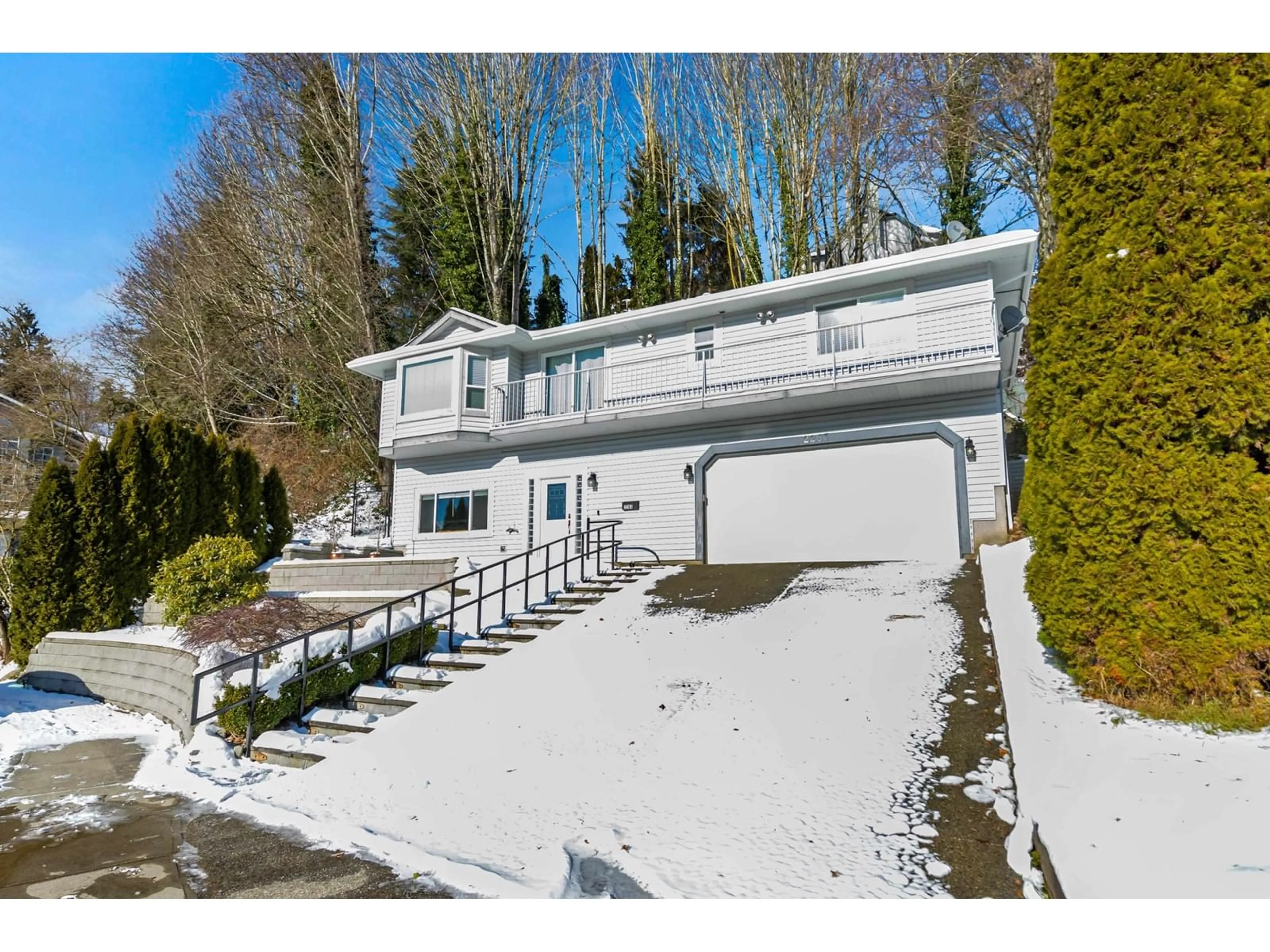 A pic from outside/outdoor area/front of a property/back of a property/a pic from drone, street for 2263 SENTINEL DRIVE, Abbotsford British Columbia V2S5C9