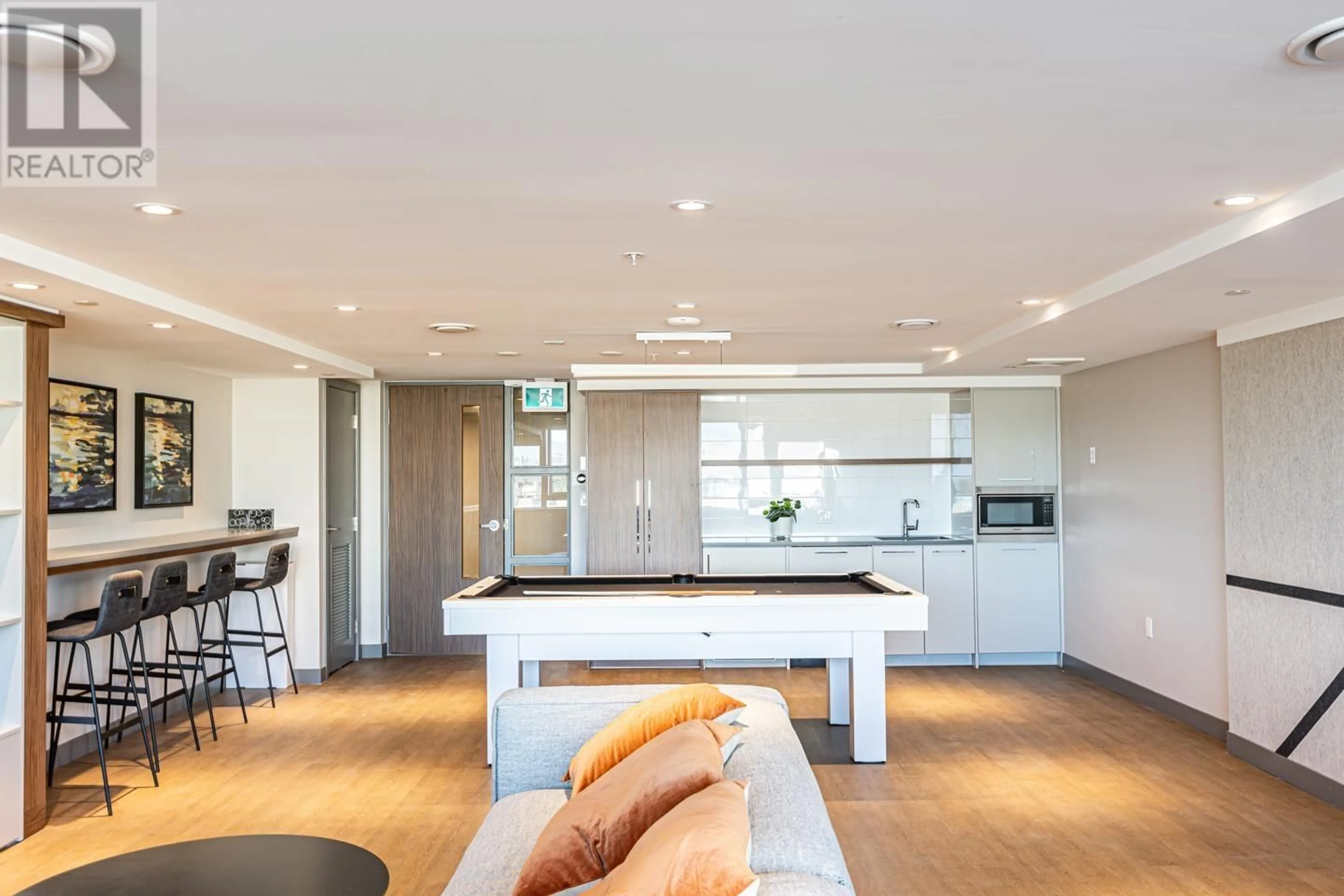 Open concept kitchen, wood/laminate floor for 1002 - 3280 CORVETTE WAY, Richmond British Columbia V6X0T9