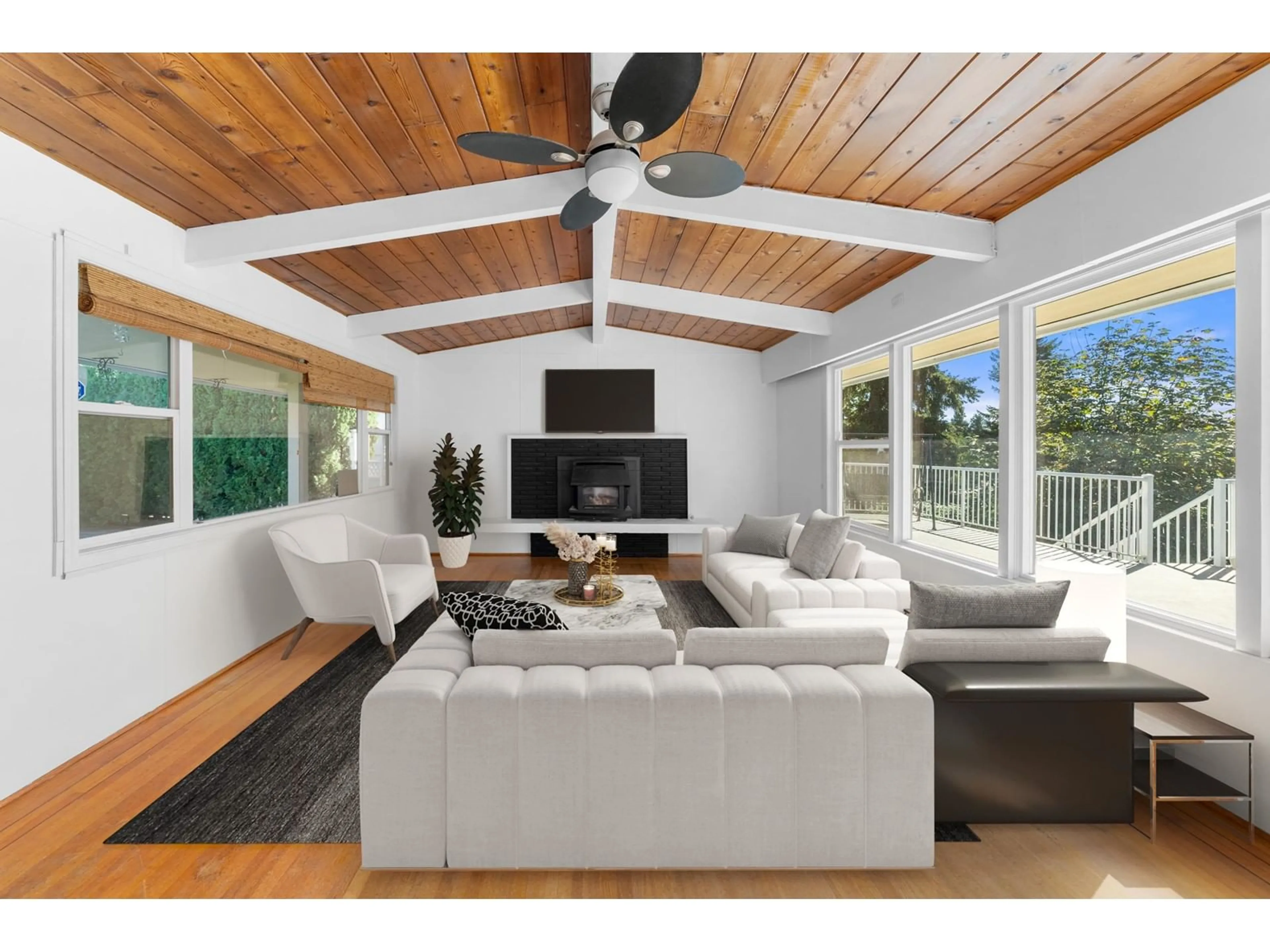 Living room with furniture, wood/laminate floor for 32870 2ND, Mission British Columbia V2V1J2