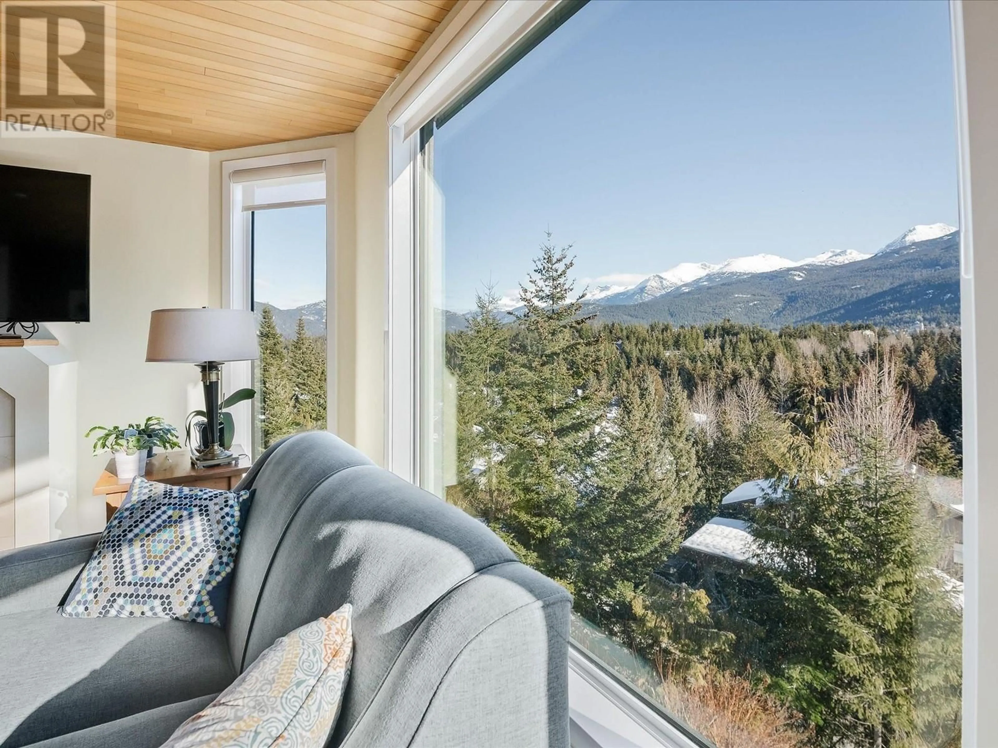 Living room with furniture, unknown for 205 - 3217 BLUEBERRY DRIVE, Whistler British Columbia V8E0B8