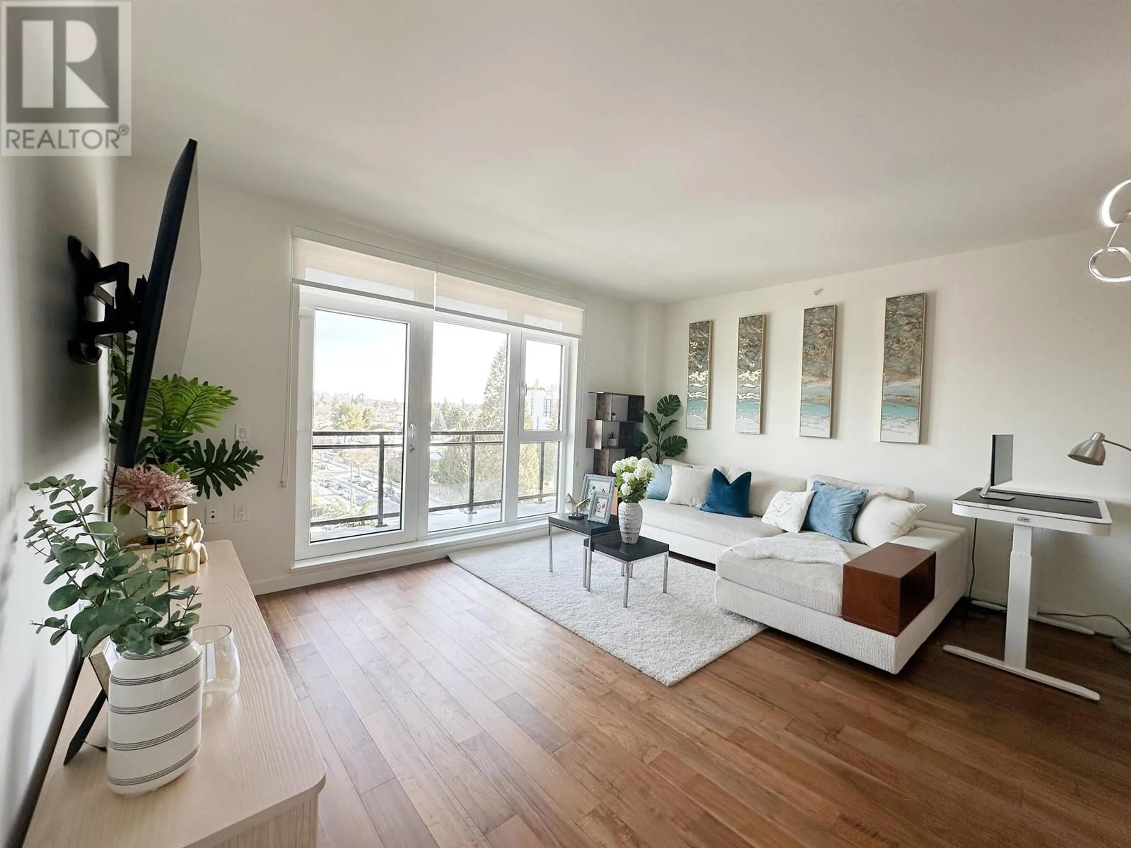 Living room with furniture, wood/laminate floor for 601 - 4189 CAMBIE STREET, Vancouver British Columbia V5Z2Y2