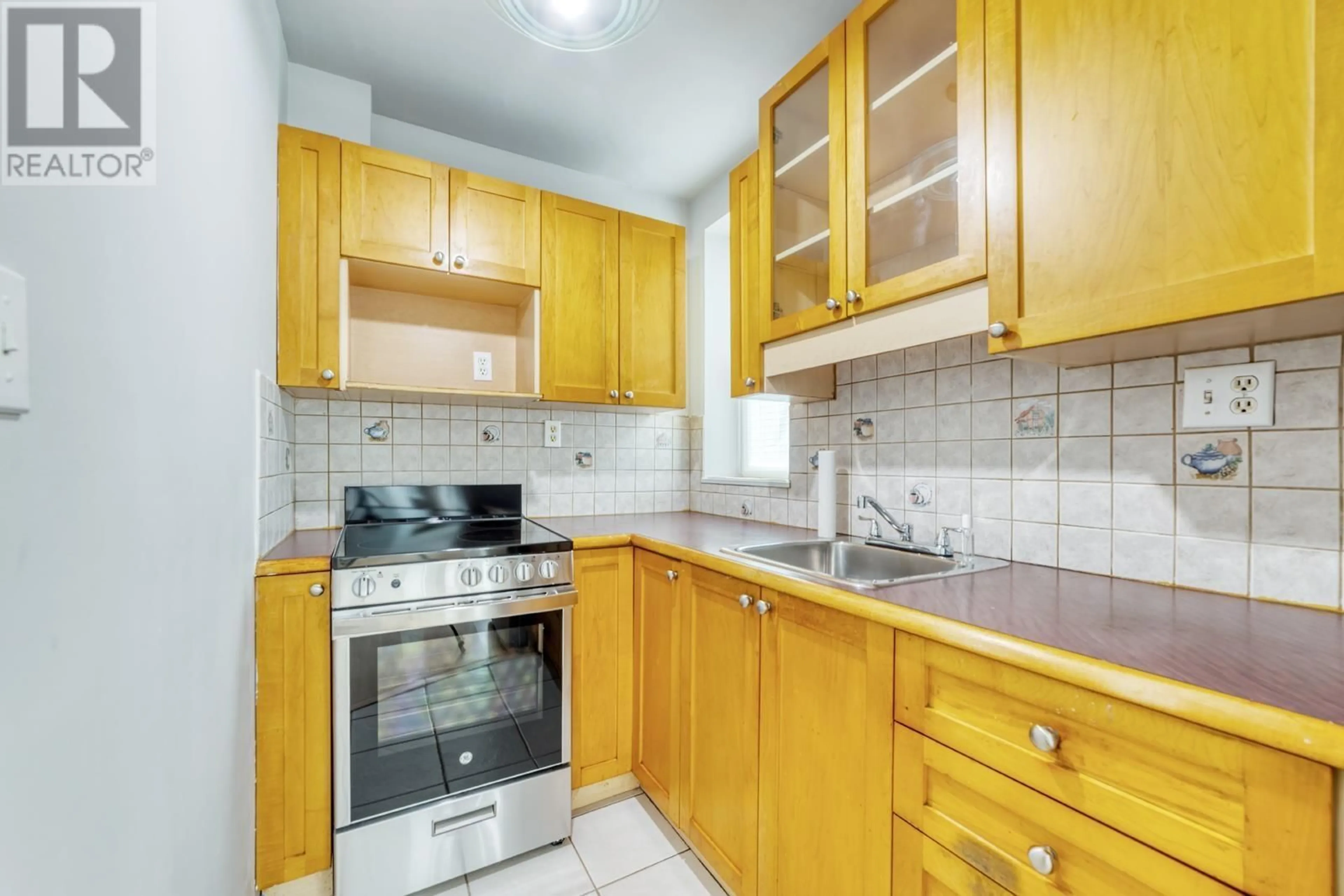 Standard kitchen, unknown for 104 8680 FREMLIN STREET, Vancouver British Columbia V6P3X3