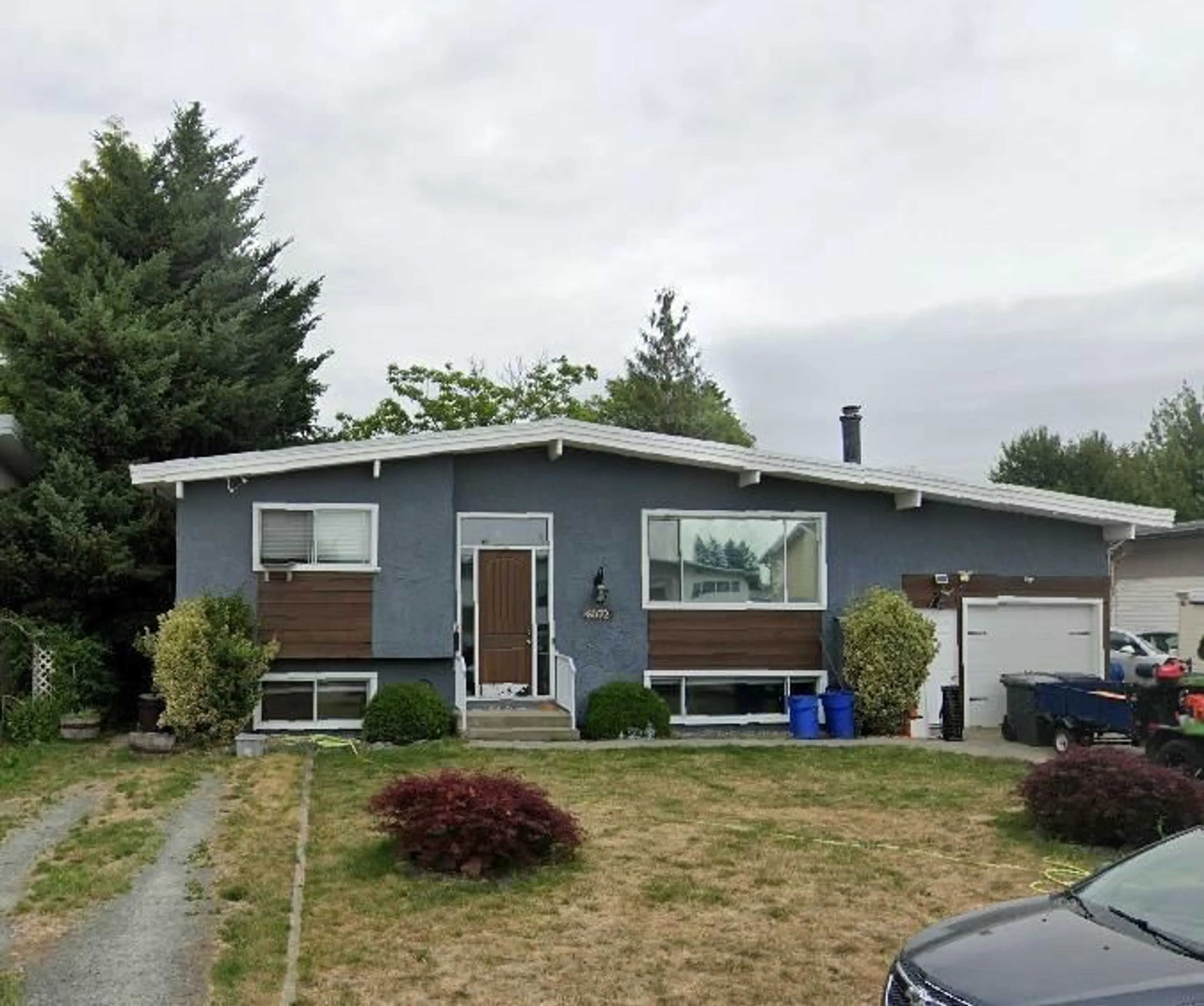 Home with vinyl exterior material, street for 6072 GLENROY DRIVE|Sardis South, Chilliwack British Columbia V2R2J1