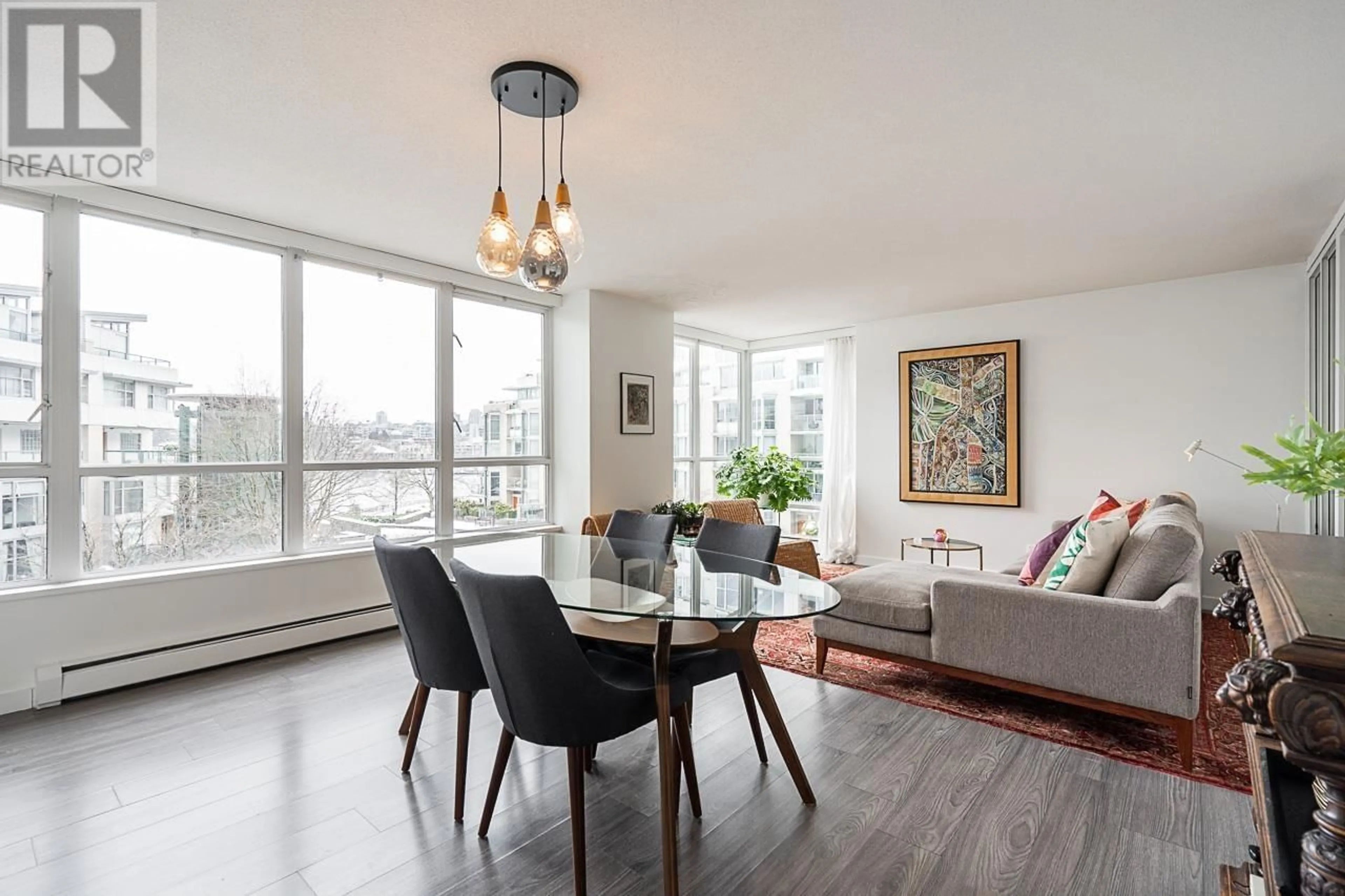 Dining room, wood/laminate floor for 302 - 1228 MARINASIDE CRESCENT, Vancouver British Columbia V6Z2W4