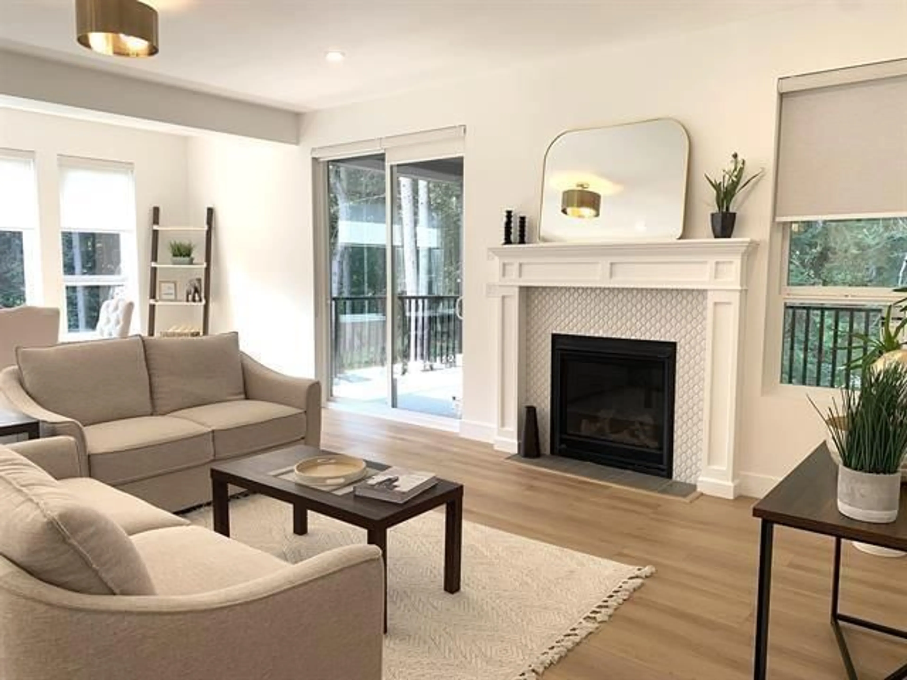 Living room with furniture, wood/laminate floor for 34288 FERNDALE AVENUE, Mission British Columbia V2V7G2