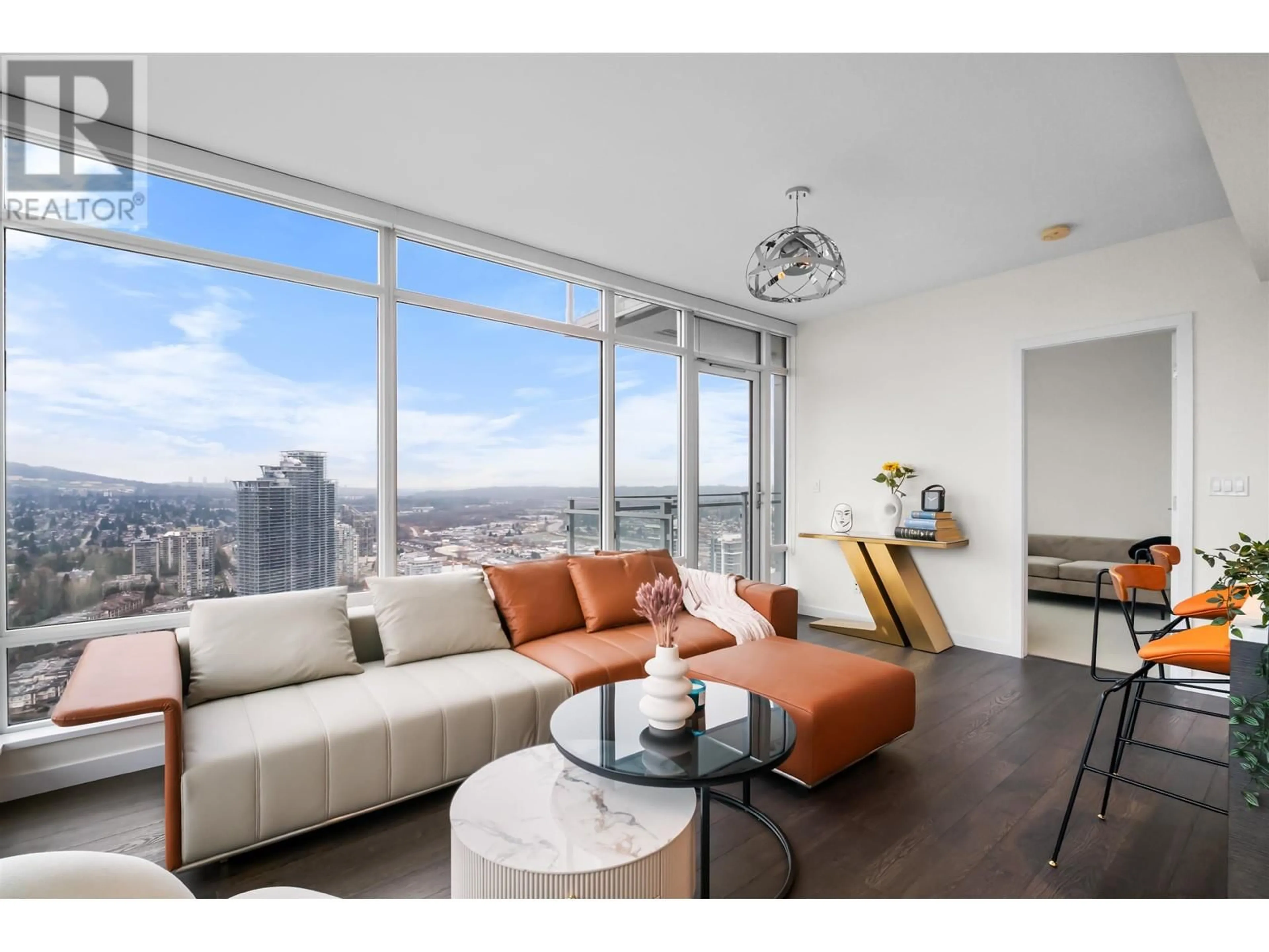 Living room with furniture, wood/laminate floor for 4005 4485 SKYLINE DRIVE, Burnaby British Columbia V5C0J2