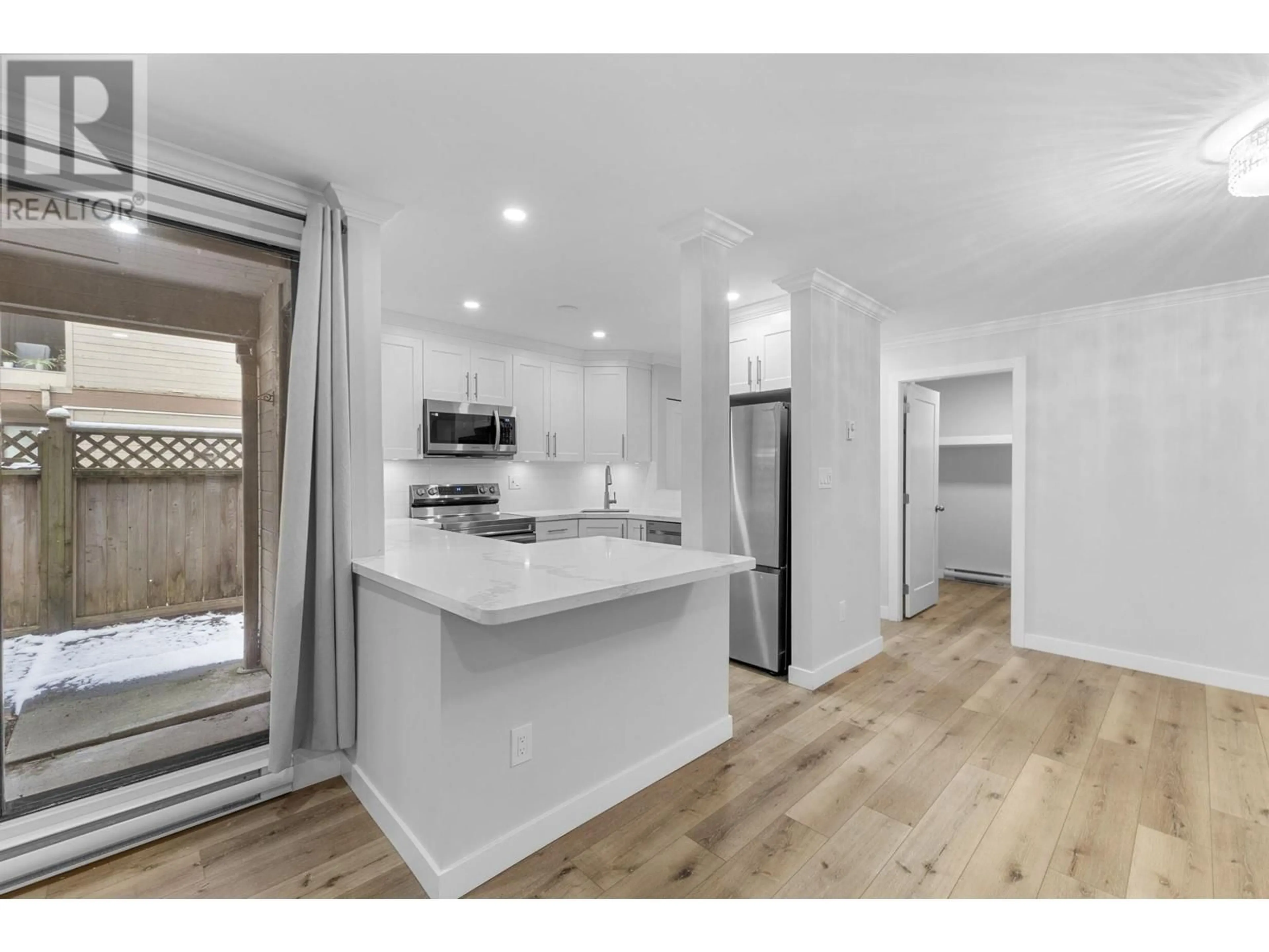 Open concept kitchen, unknown for 102 9152 SATURNA DRIVE, Burnaby British Columbia V3J7K2