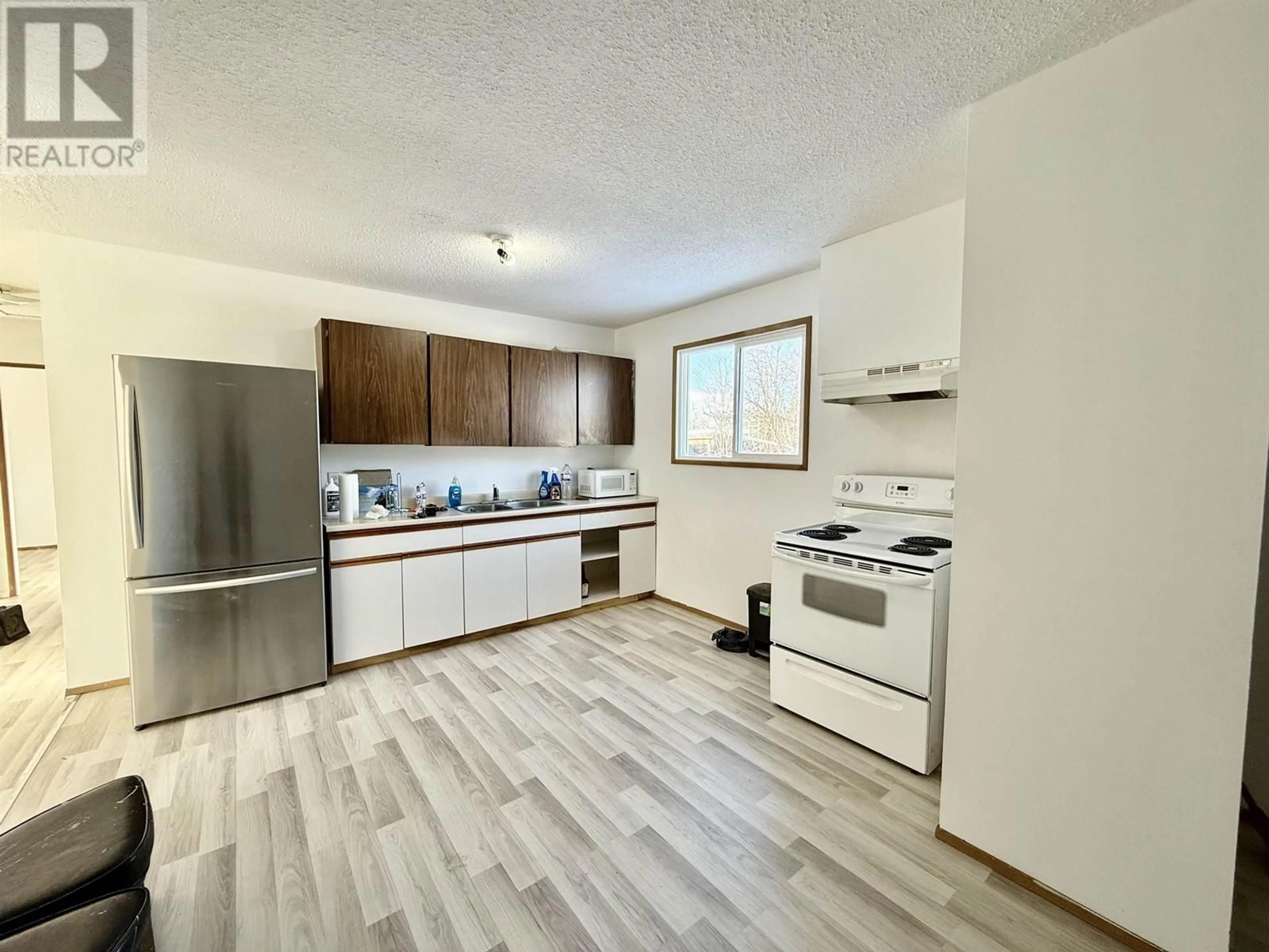 Standard kitchen, wood/laminate floor for 2131 24TH AVENUE, Hazelton British Columbia V0J2J1