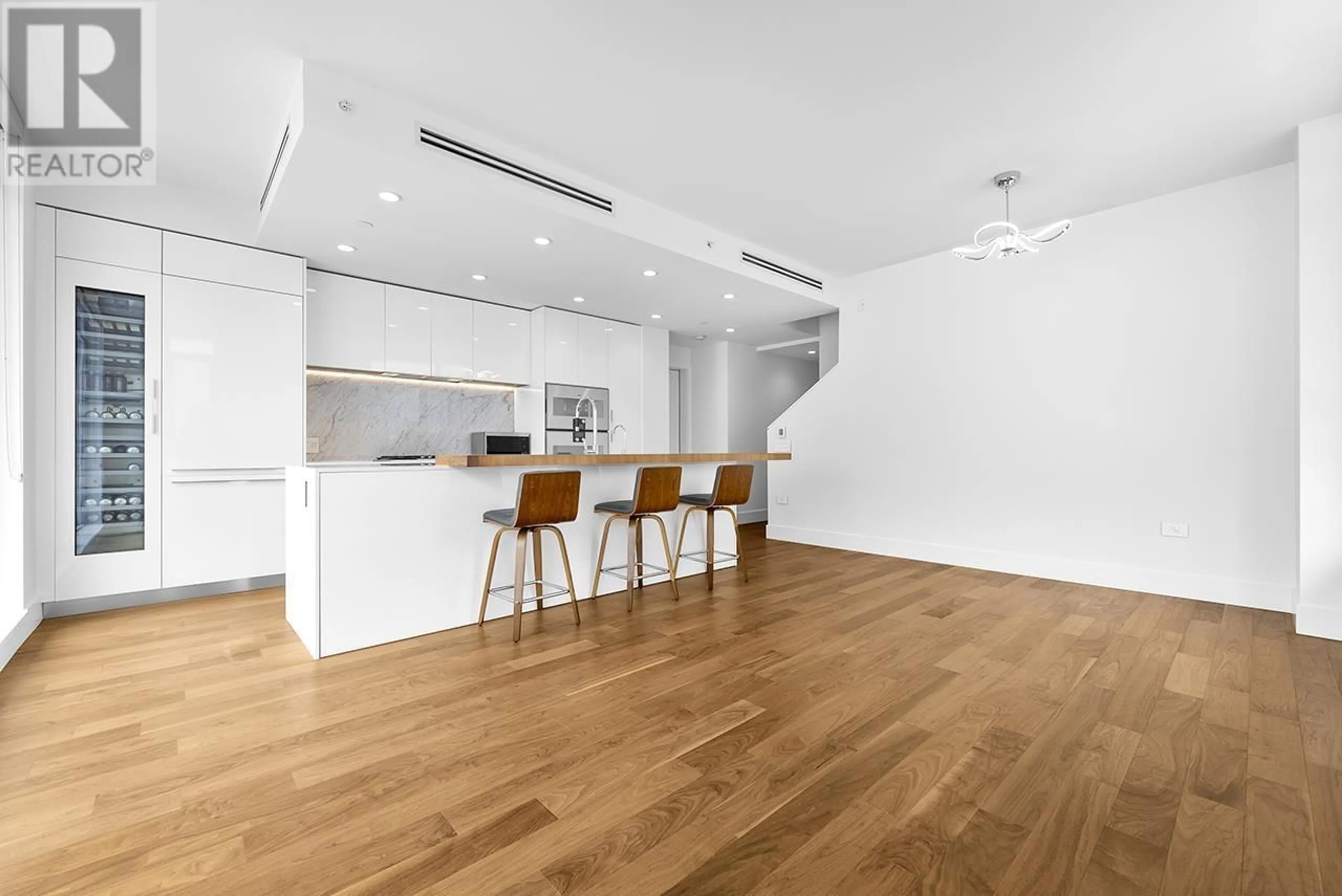 Open concept kitchen, wood/laminate floor for 605/606 - 7428 ALBERTA STREET, Vancouver British Columbia V5X0J5