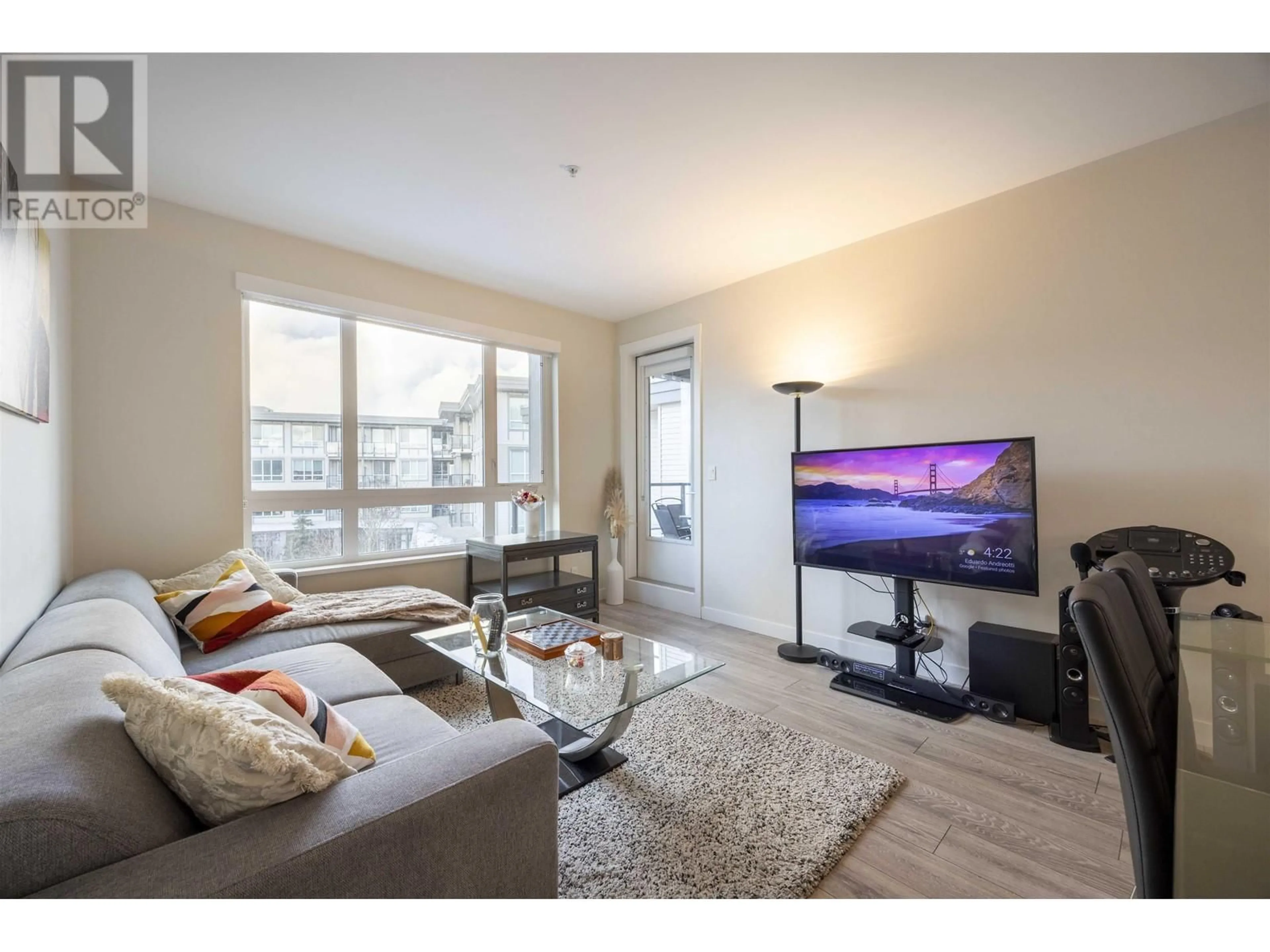 Living room with furniture, wood/laminate floor for 320 23233 GILLEY ROAD, Richmond British Columbia V6V1E6