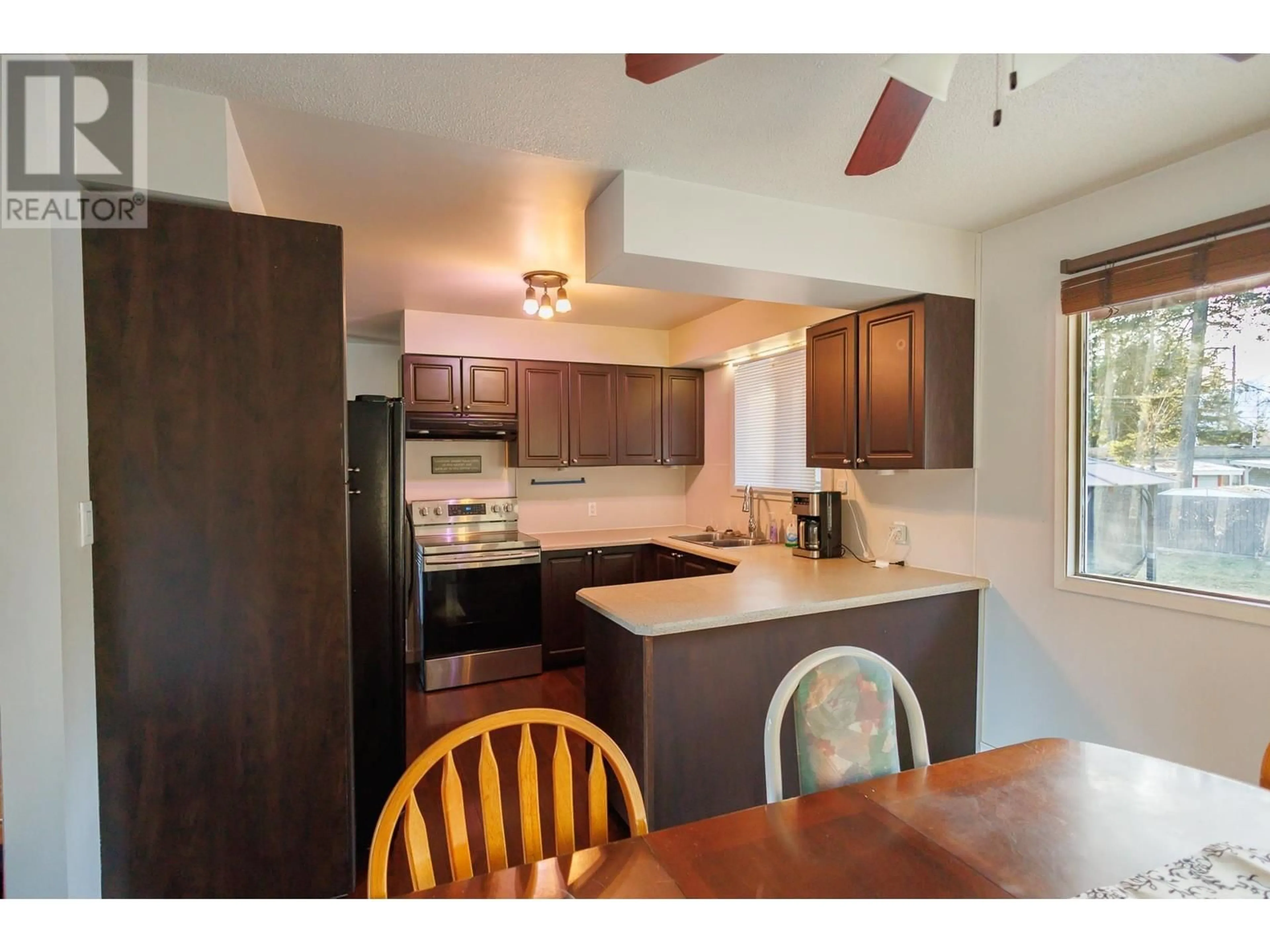 Standard kitchen, wood/laminate floor for 3313 PHEASANT STREET, Terrace British Columbia V8G3H4