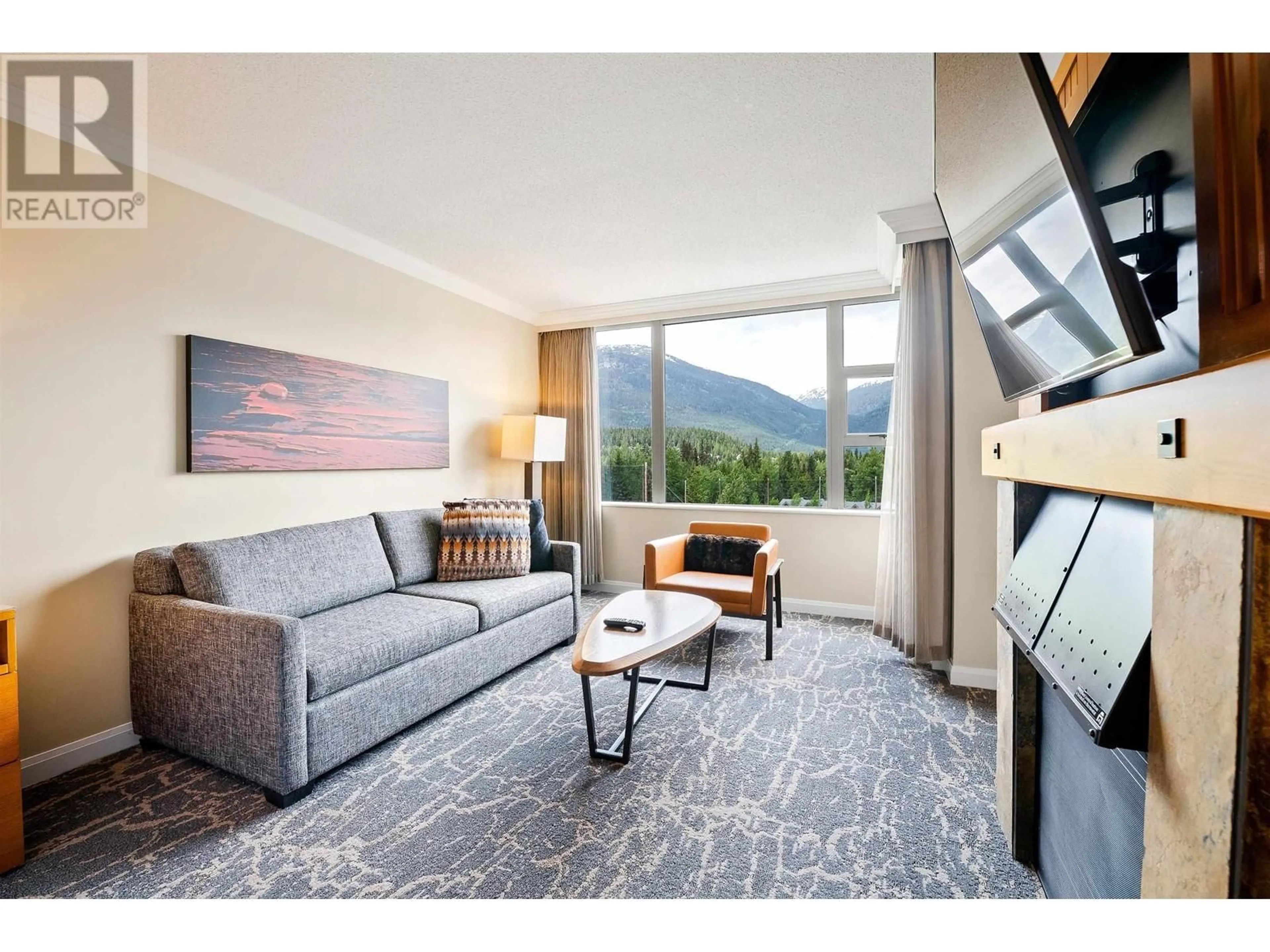 Living room with furniture, unknown for 861 4090 WHISTLER WAY, Whistler British Columbia V8E1J3