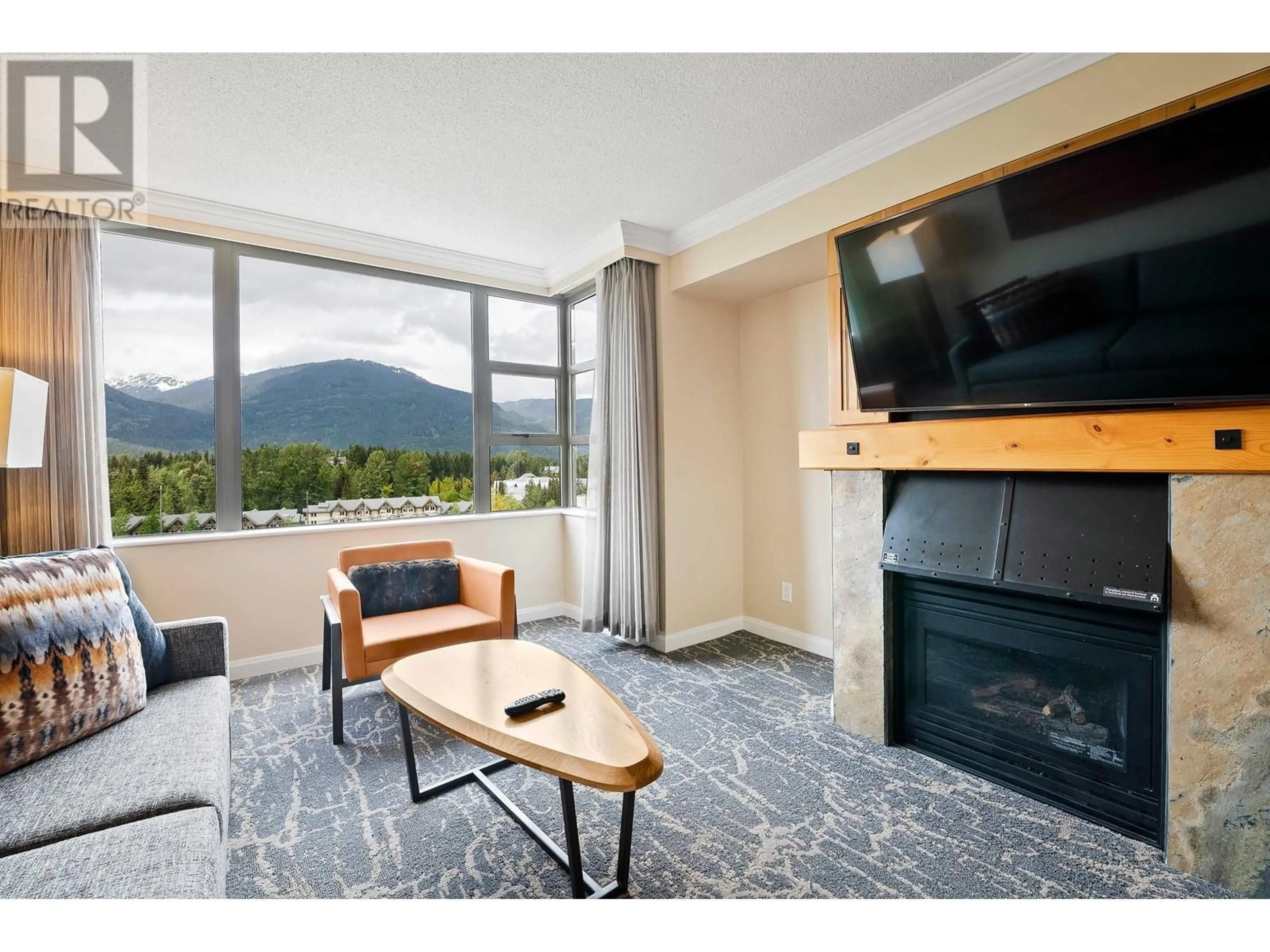 Living room with furniture, unknown for 861 4090 WHISTLER WAY, Whistler British Columbia V8E1J3