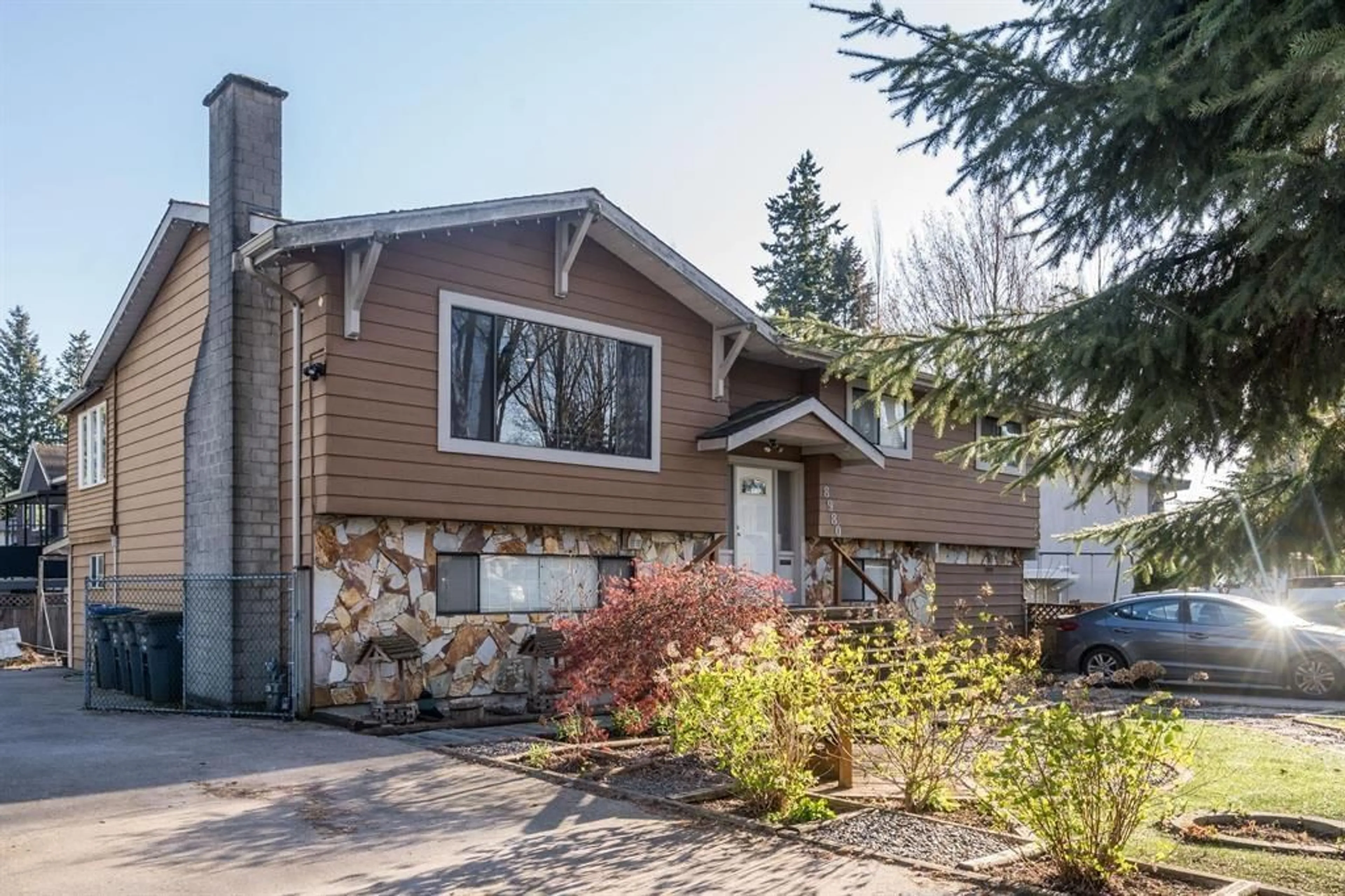 Home with vinyl exterior material, street for 8980 146A, Surrey British Columbia V3R7C2