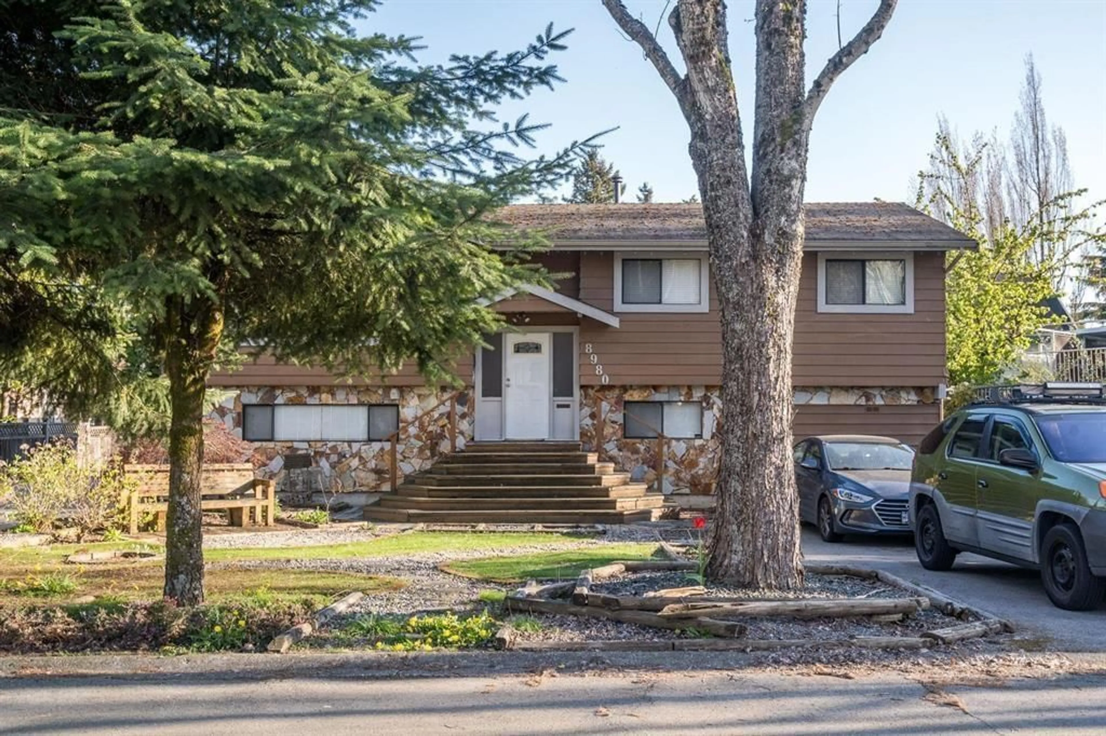 Home with vinyl exterior material, street for 8980 146A, Surrey British Columbia V3R7C2