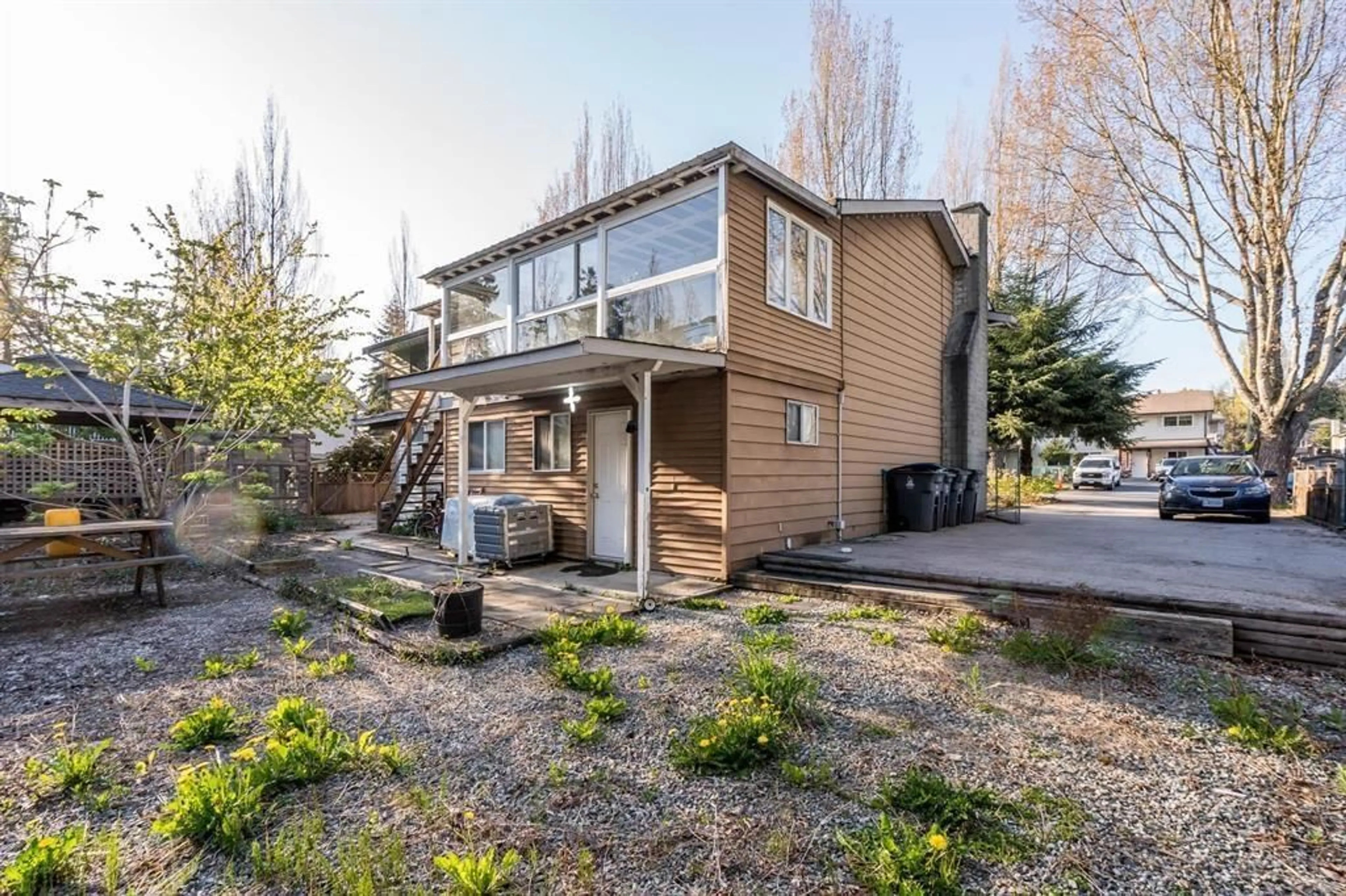 Home with vinyl exterior material, street for 8980 146A, Surrey British Columbia V3R7C2