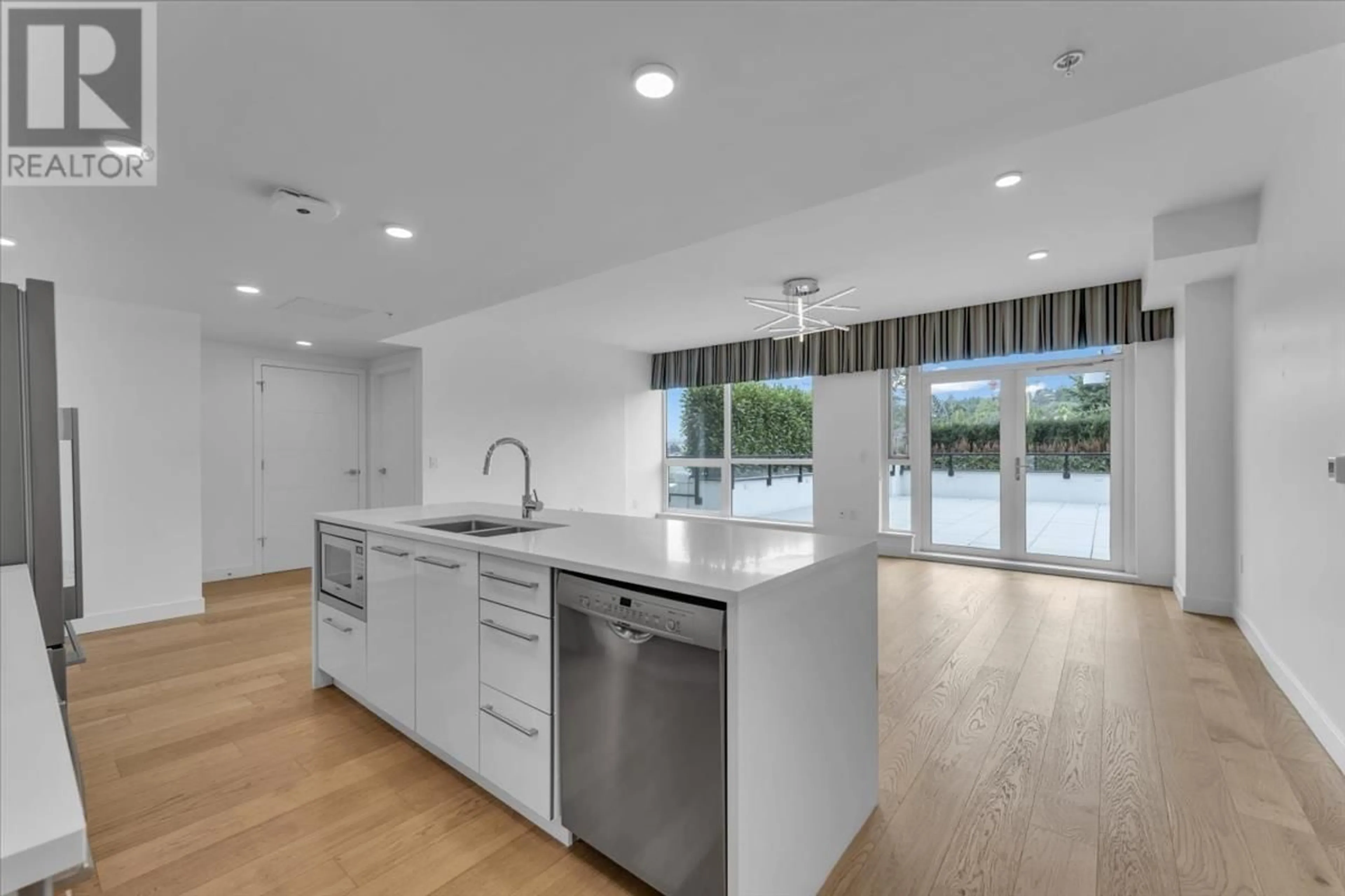 Open concept kitchen, unknown for 371 - 438 KING EDWARD AVENUE, Vancouver British Columbia V5Y0M5