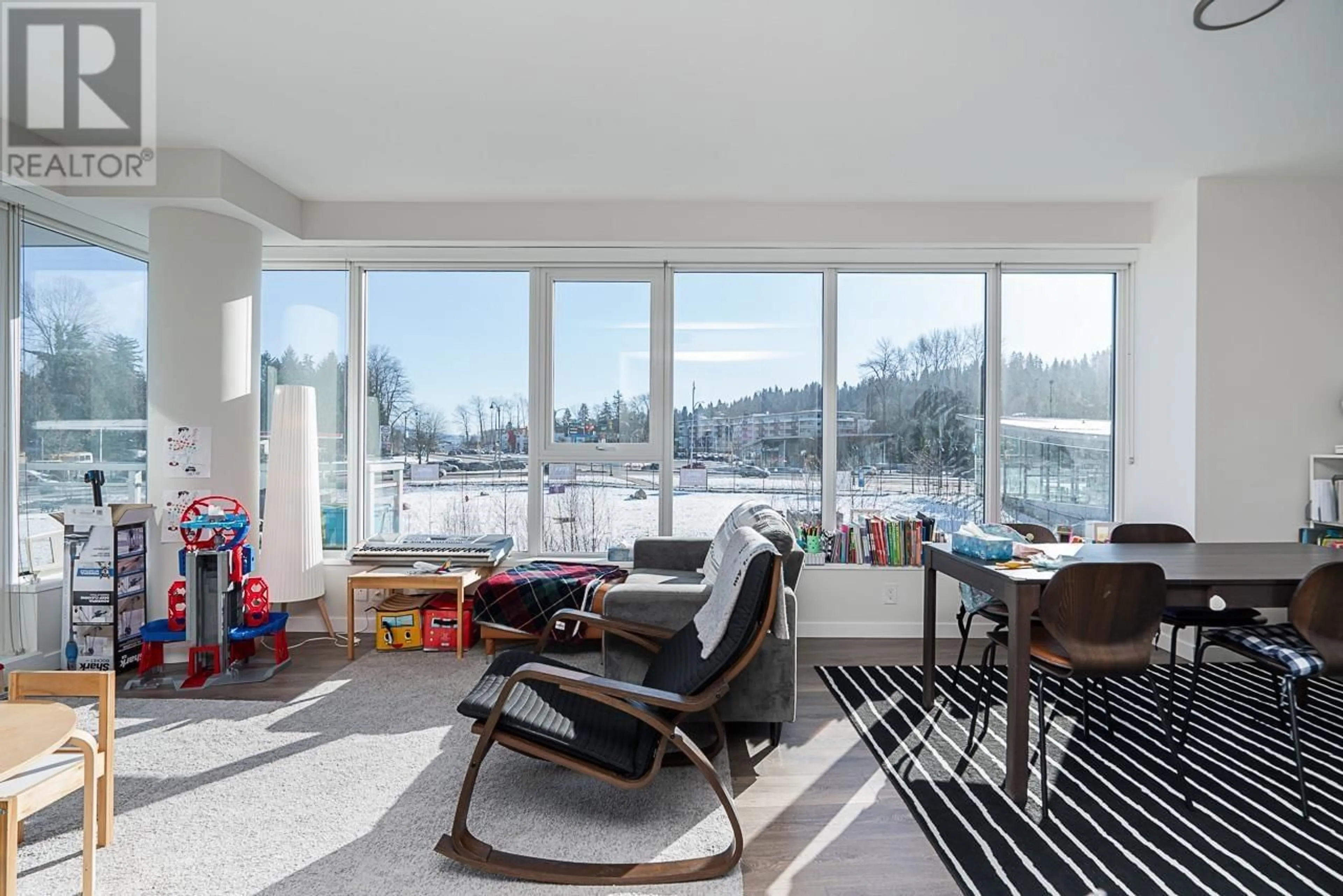 Living room with furniture, unknown for 602 - 308 MORRISSEY ROAD, Port Moody British Columbia V3H0M2