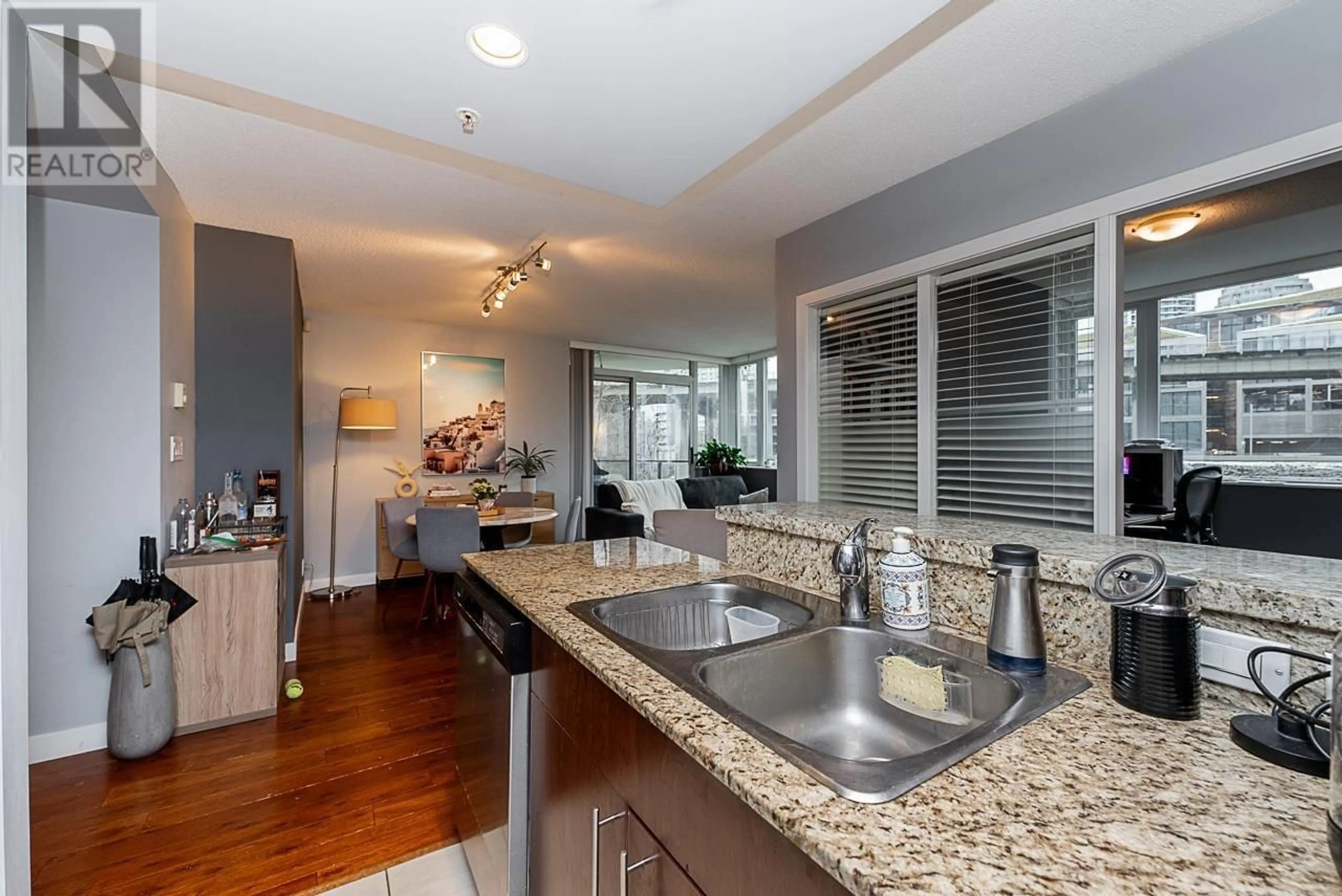 Open concept kitchen, ceramic/tile floor for 301 583 BEACH CRESCENT, Vancouver British Columbia V6Z3E6