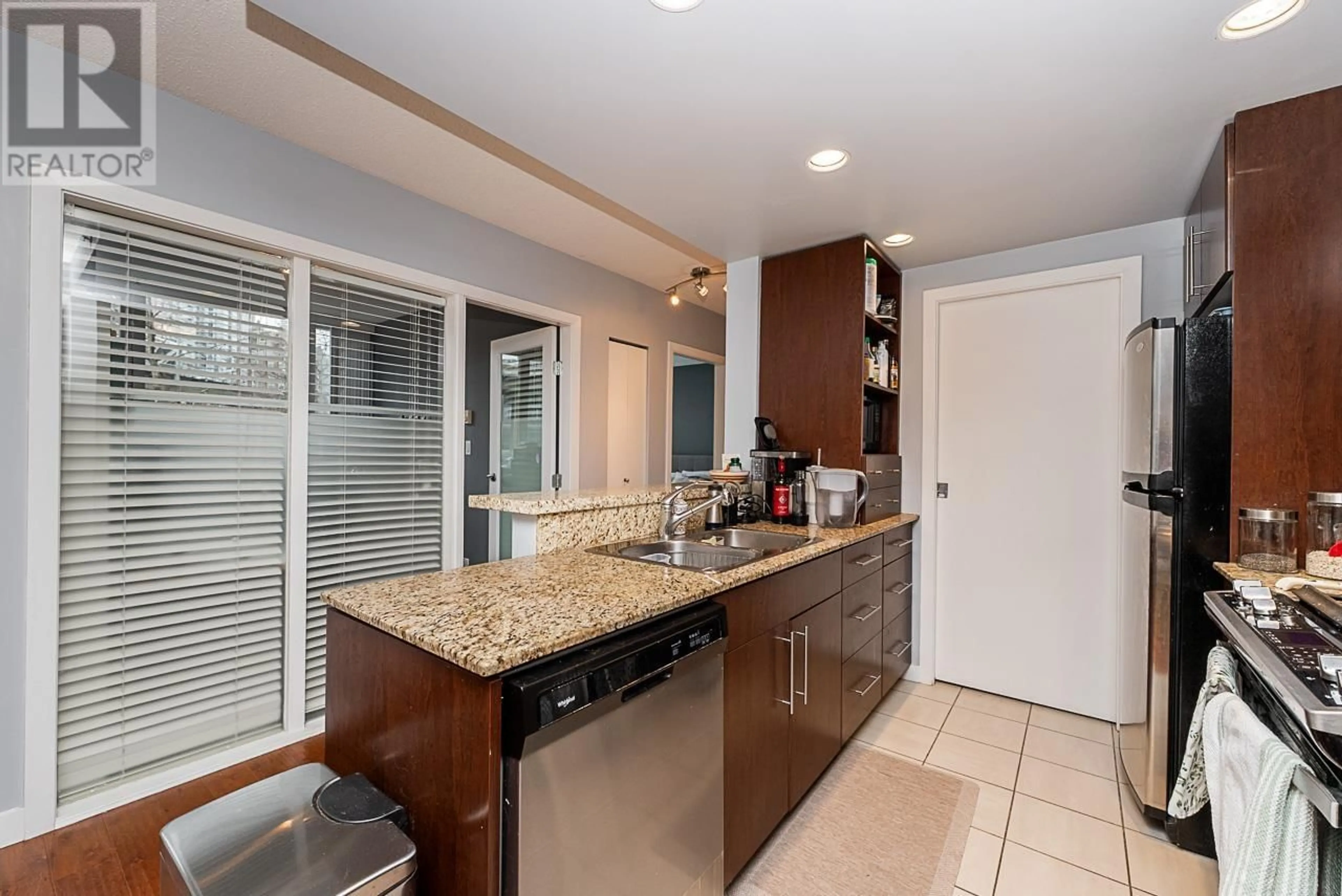 Open concept kitchen, ceramic/tile floor for 301 583 BEACH CRESCENT, Vancouver British Columbia V6Z3E6