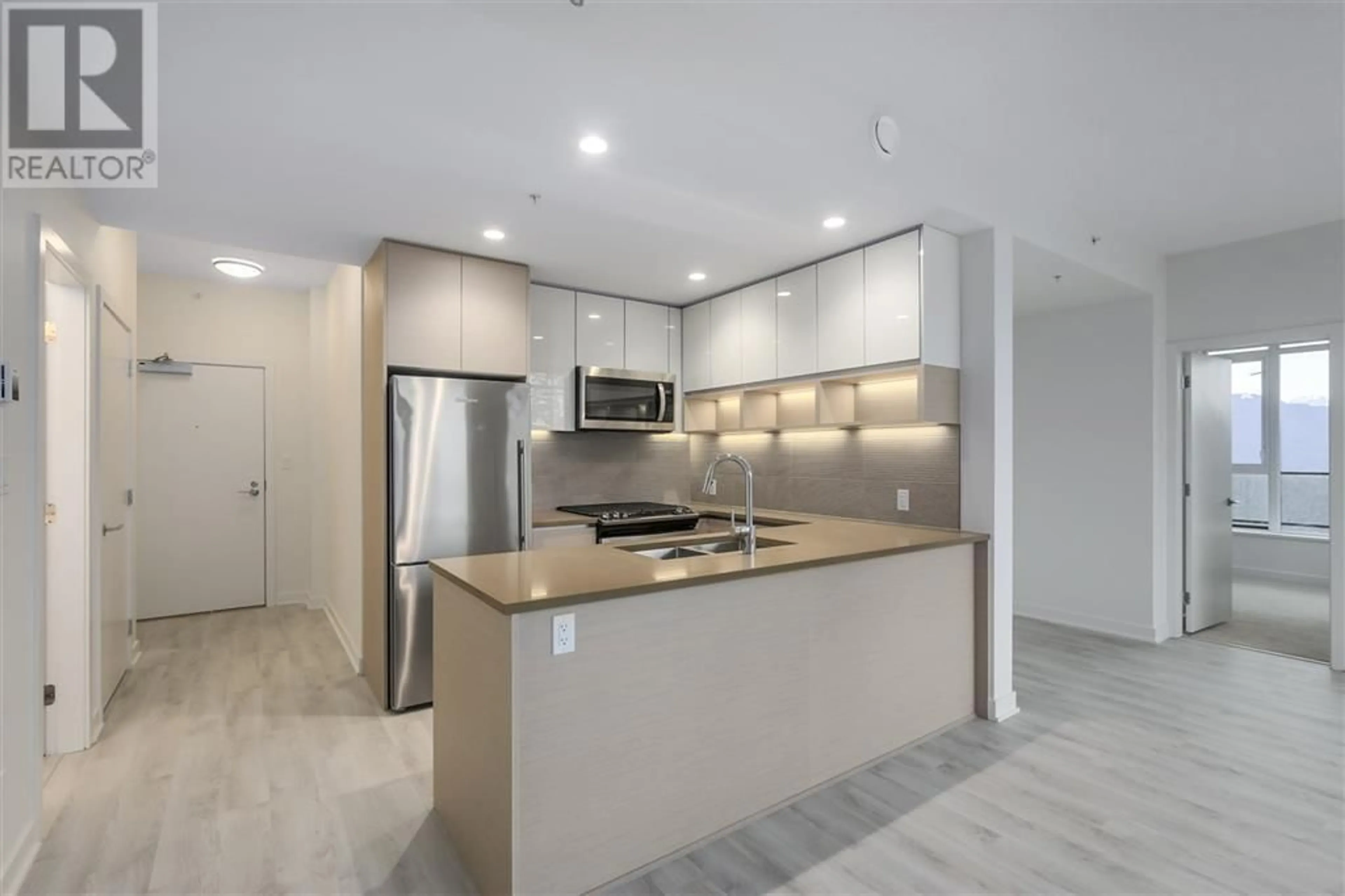 Open concept kitchen, unknown for 303 8850 UNIVERSITY CRESCENT, Burnaby British Columbia V5A4Y8