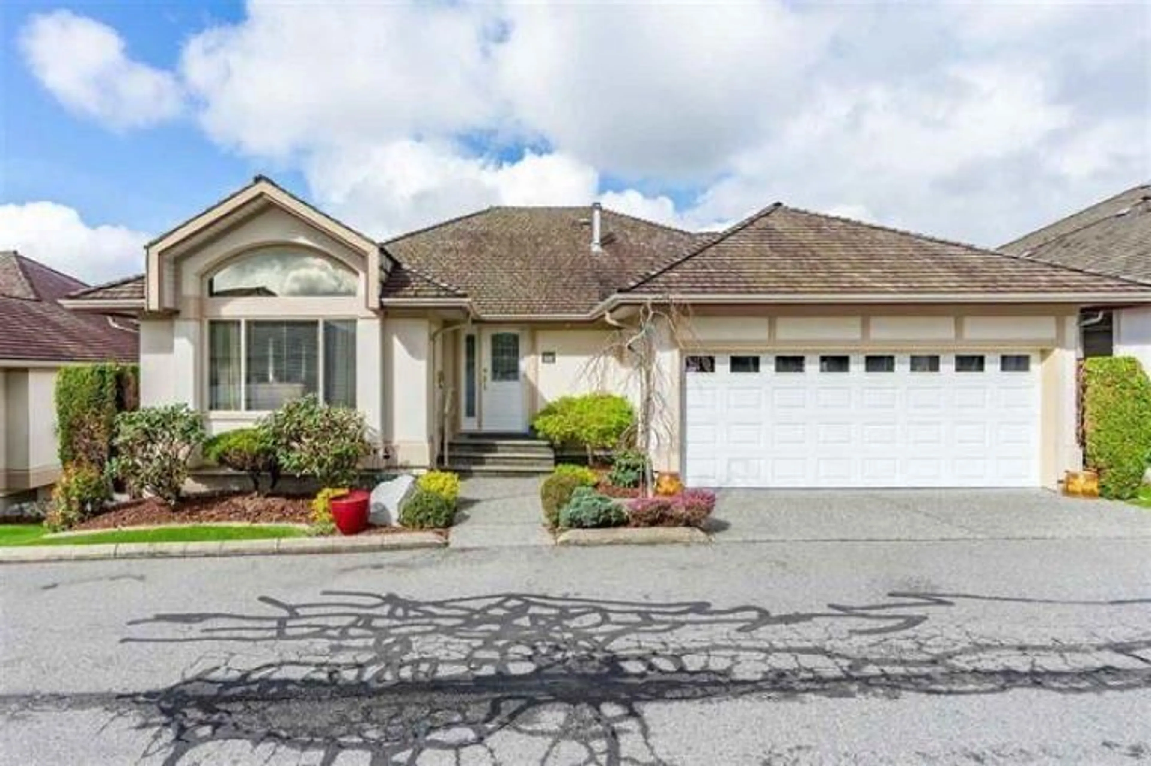 Home with vinyl exterior material, street for 24 30703 BLUERIDGE DRIVE, Abbotsford British Columbia V2T6M8