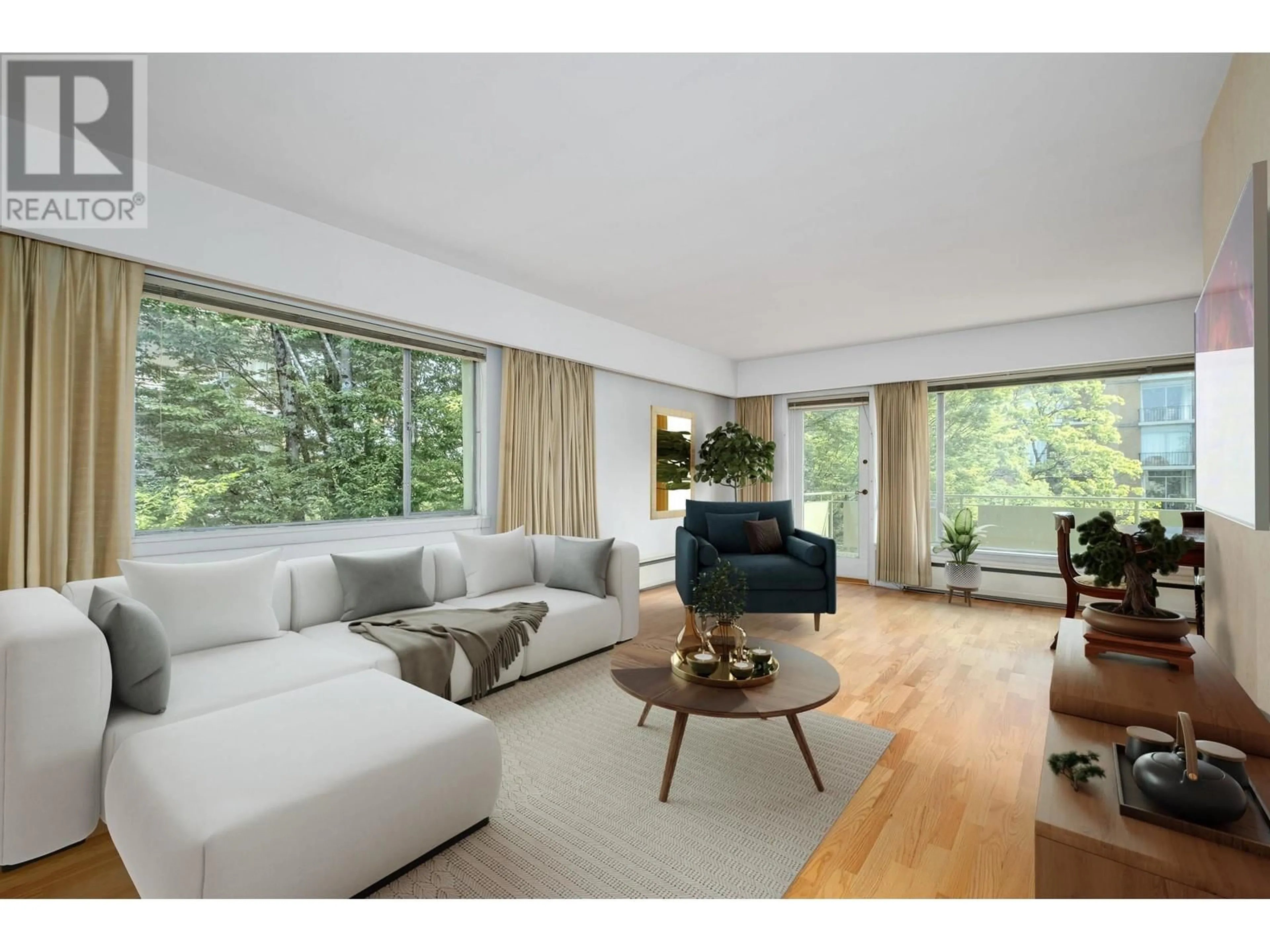 Living room with furniture, wood/laminate floor for 303 - 5475 VINE STREET, Vancouver British Columbia V6M3Z7