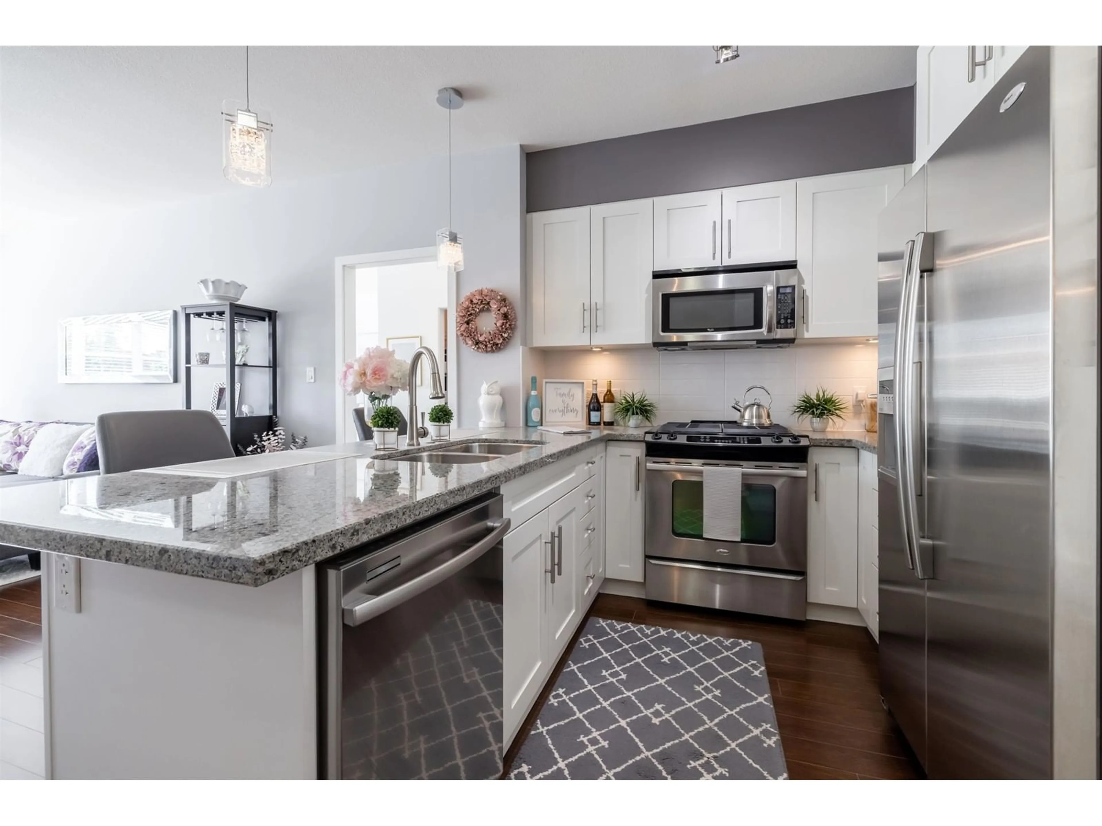 Open concept kitchen, ceramic/tile floor for 312 23215 BILLY BROWN ROAD, Langley British Columbia V1M0B7