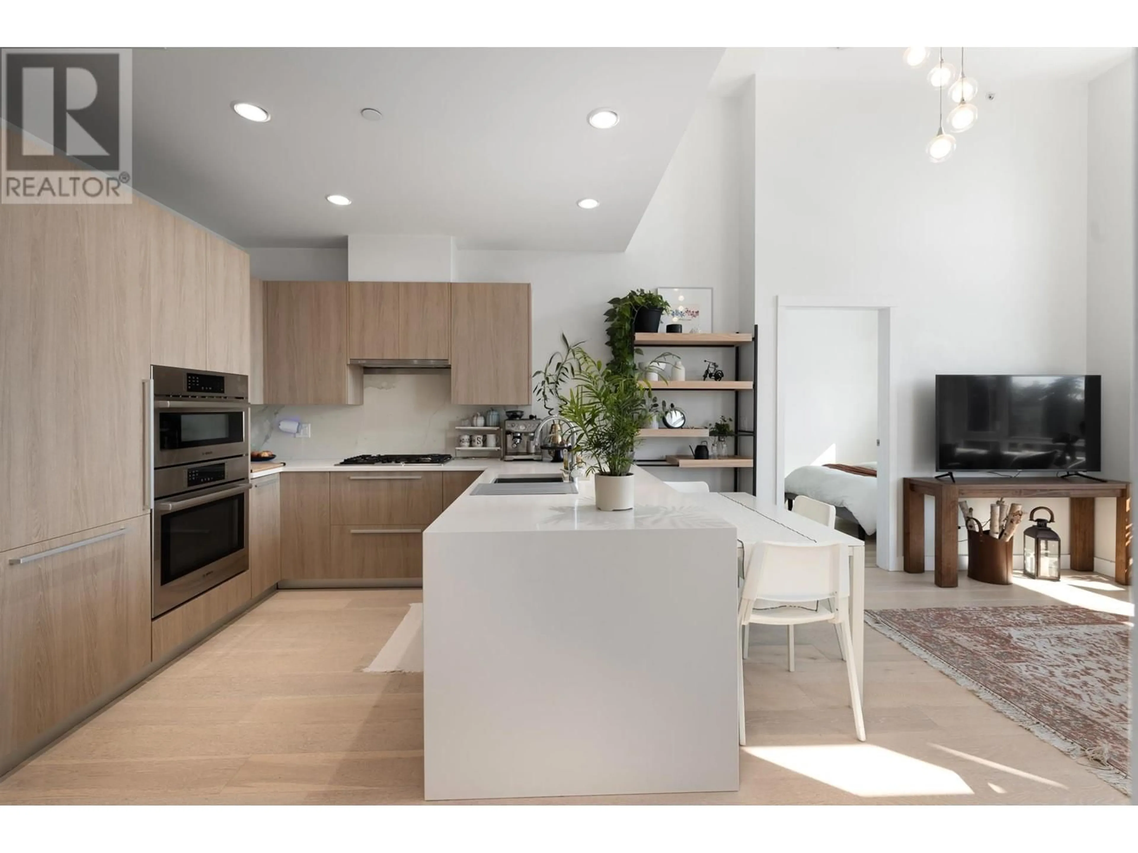 Open concept kitchen, unknown for 307 - 1295 CONIFER STREET, North Vancouver British Columbia V7J0B4
