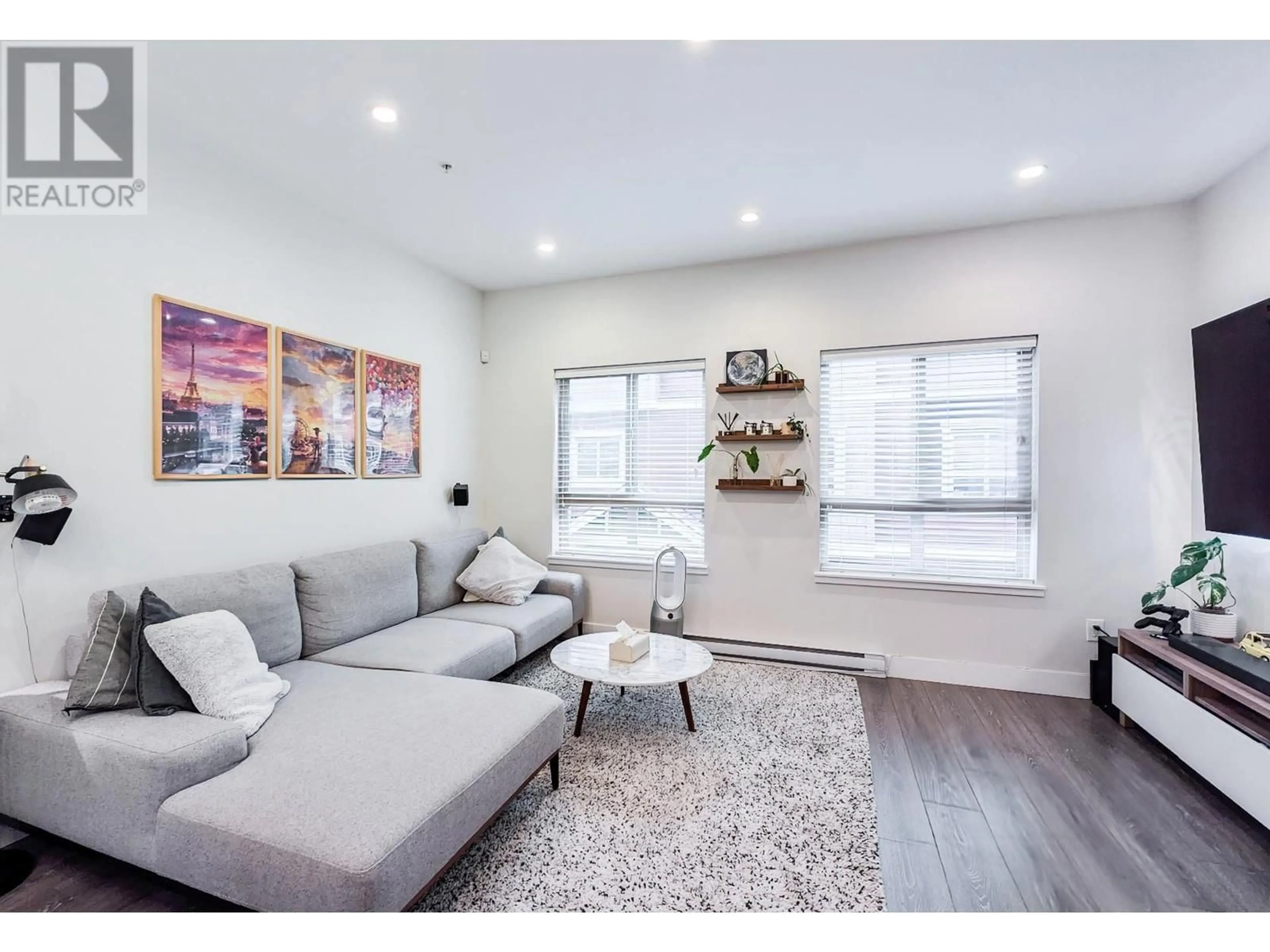 Living room with furniture, wood/laminate floor for 24 843 EWEN AVENUE, New Westminster British Columbia V3M0K6